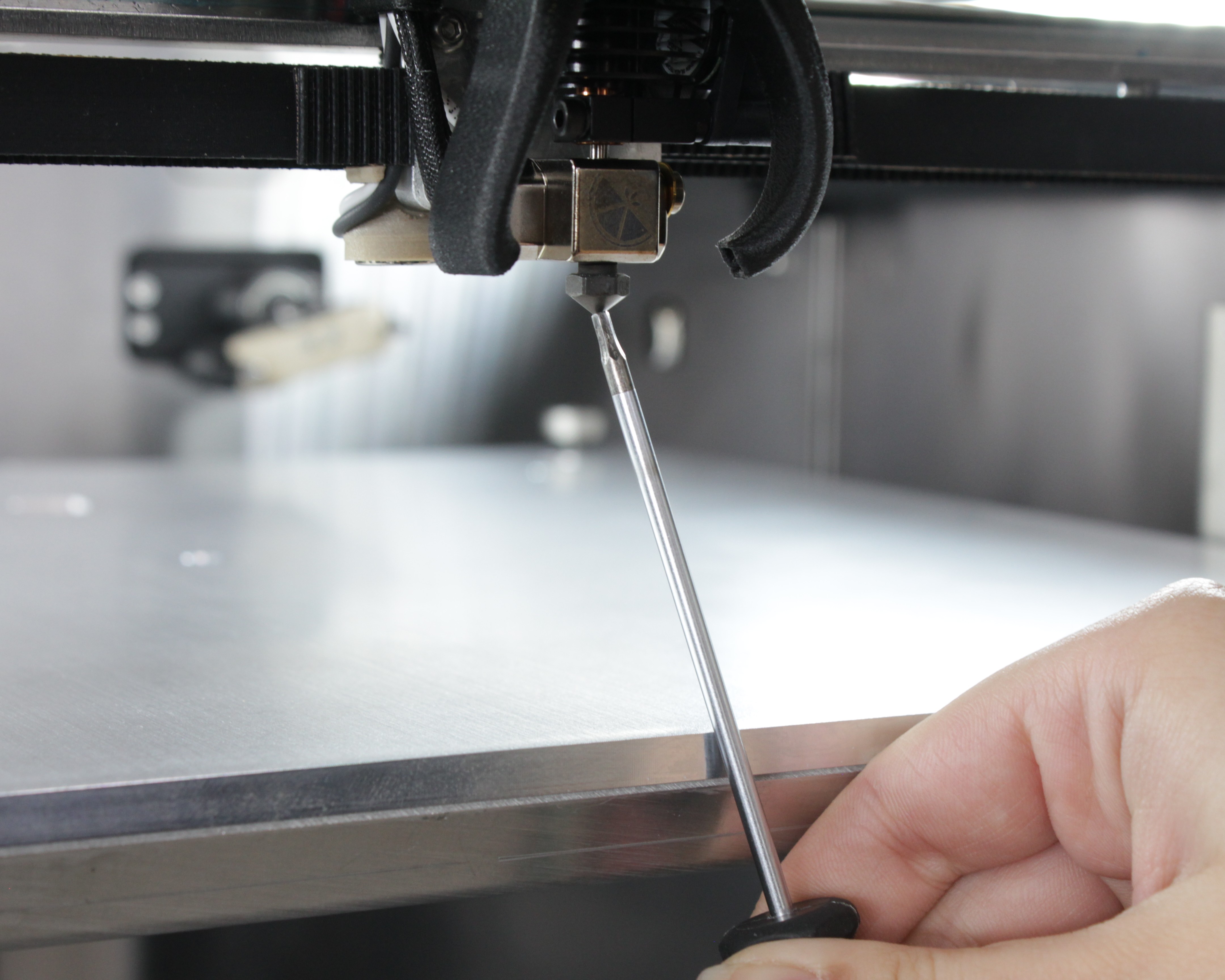 Z-Probe self-test – conductive tool touching nozzle tip to the build plate