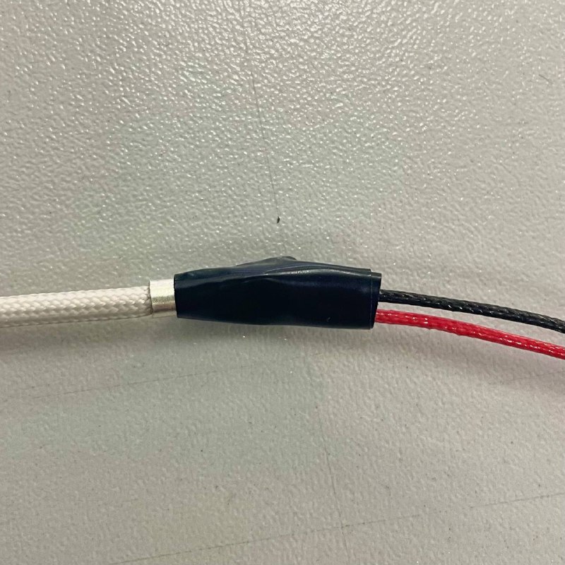 Old and new bed sensor wires tied and wrapped with tape
