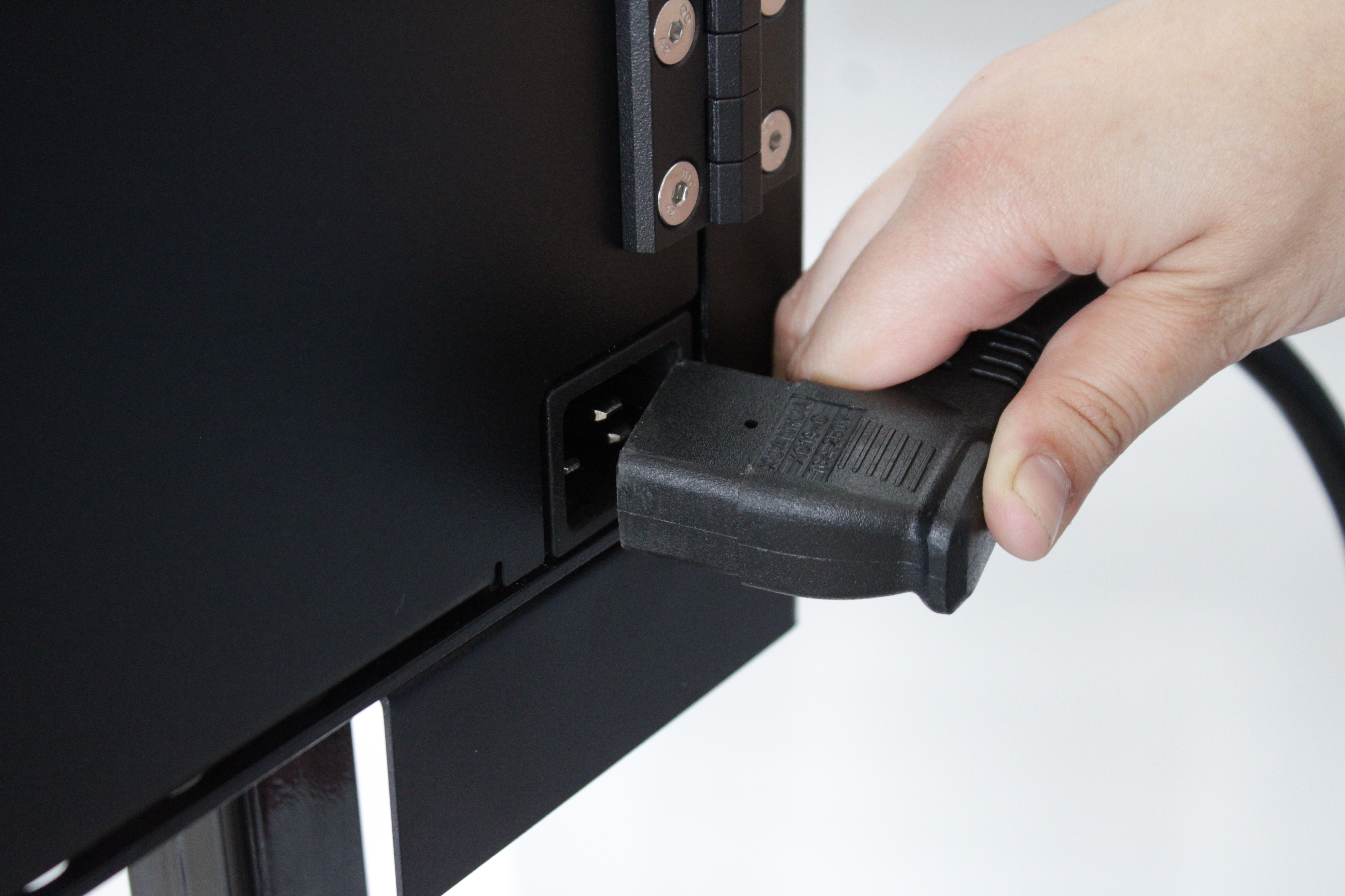 Unplugging the printer from the wall outlet to power it off