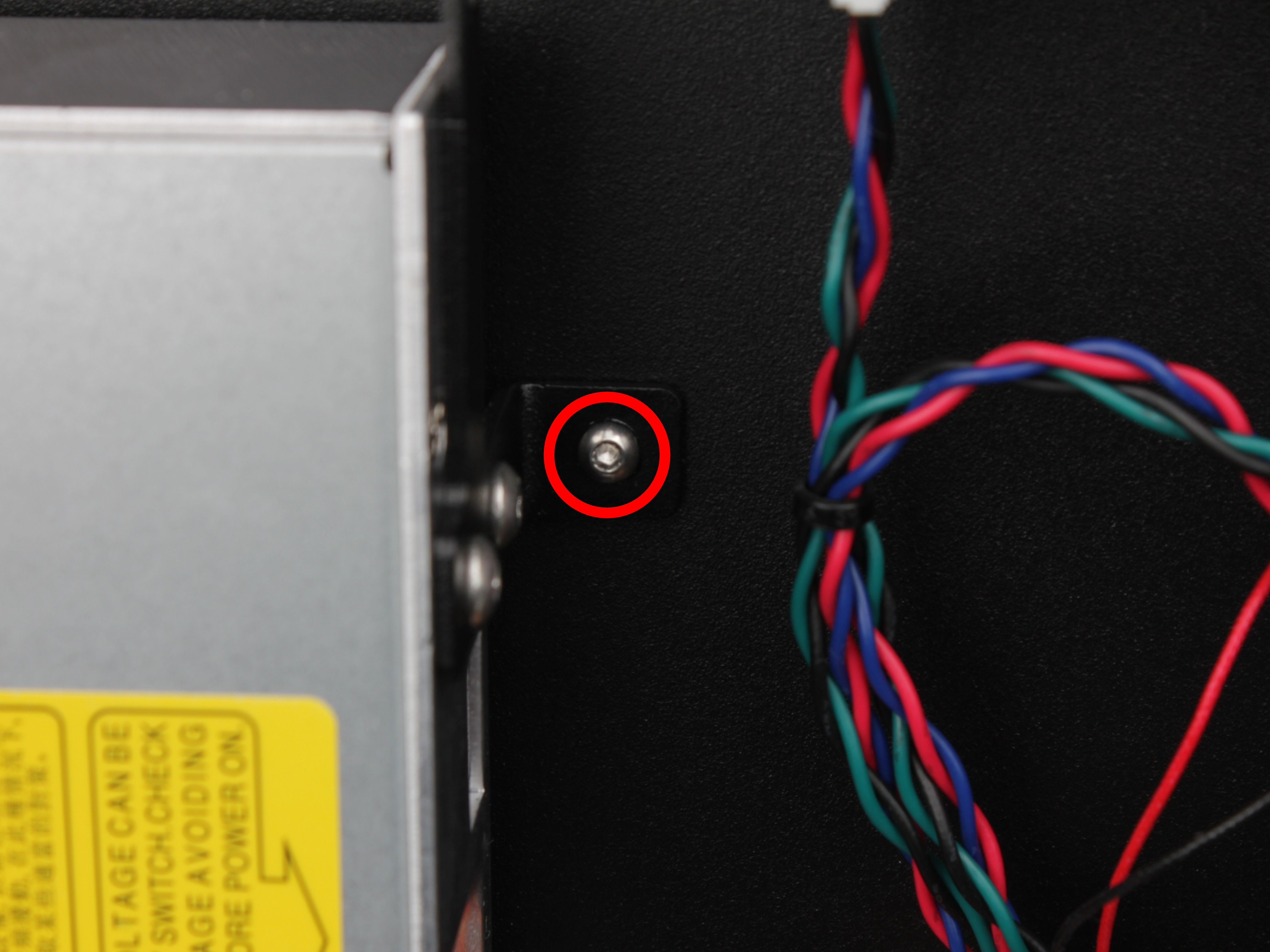 Right side of PSU, L-shaped bracket and chassis screw