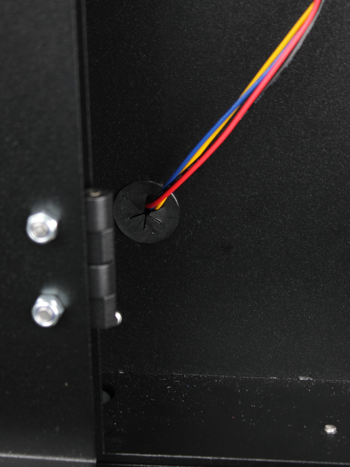 Bracket reinstalled \u2014 M3 nuts tightened from below with wrench