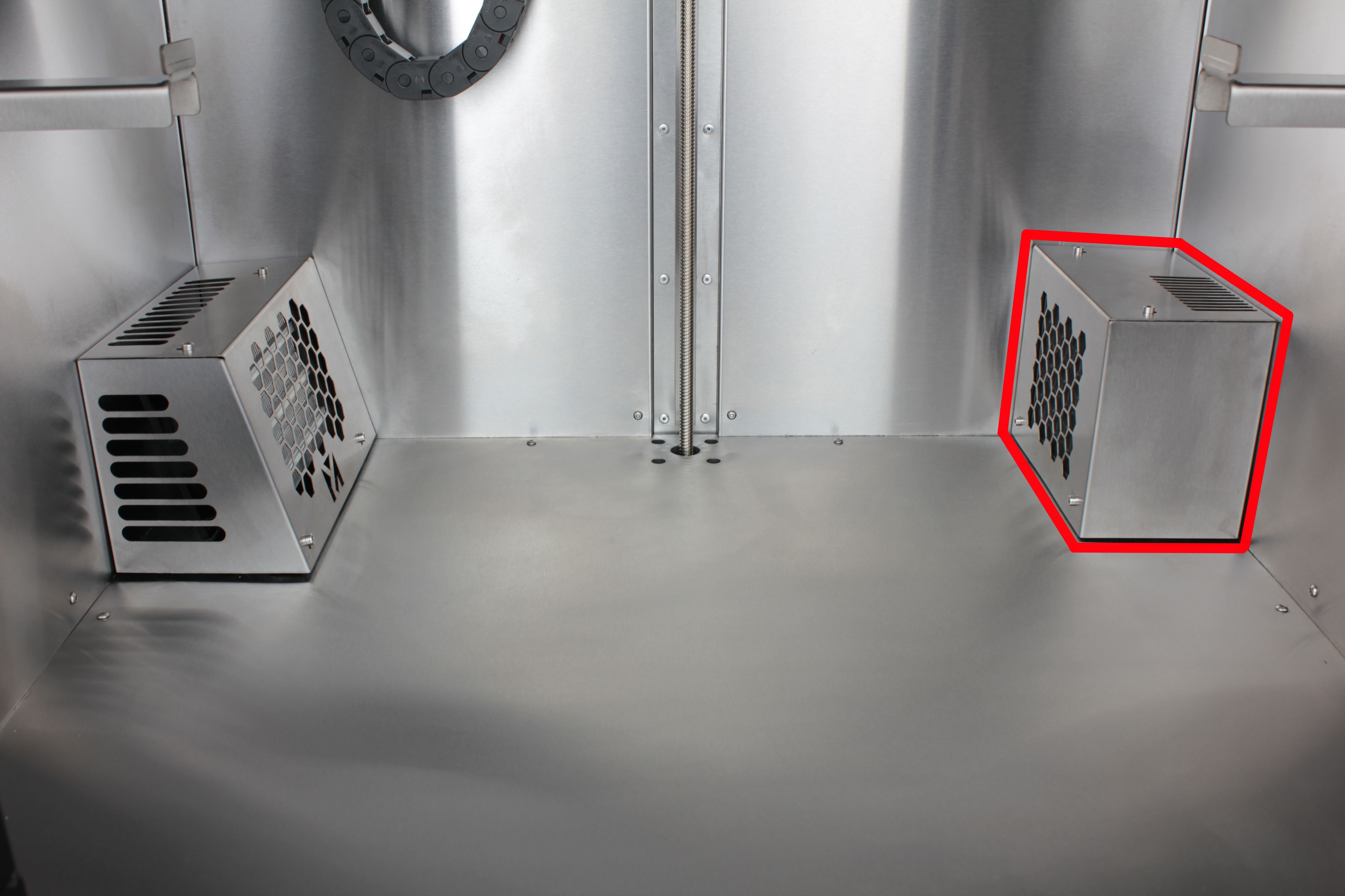 Inside enclosure \u2014 HEPA housing on the right, chamber heater on the left