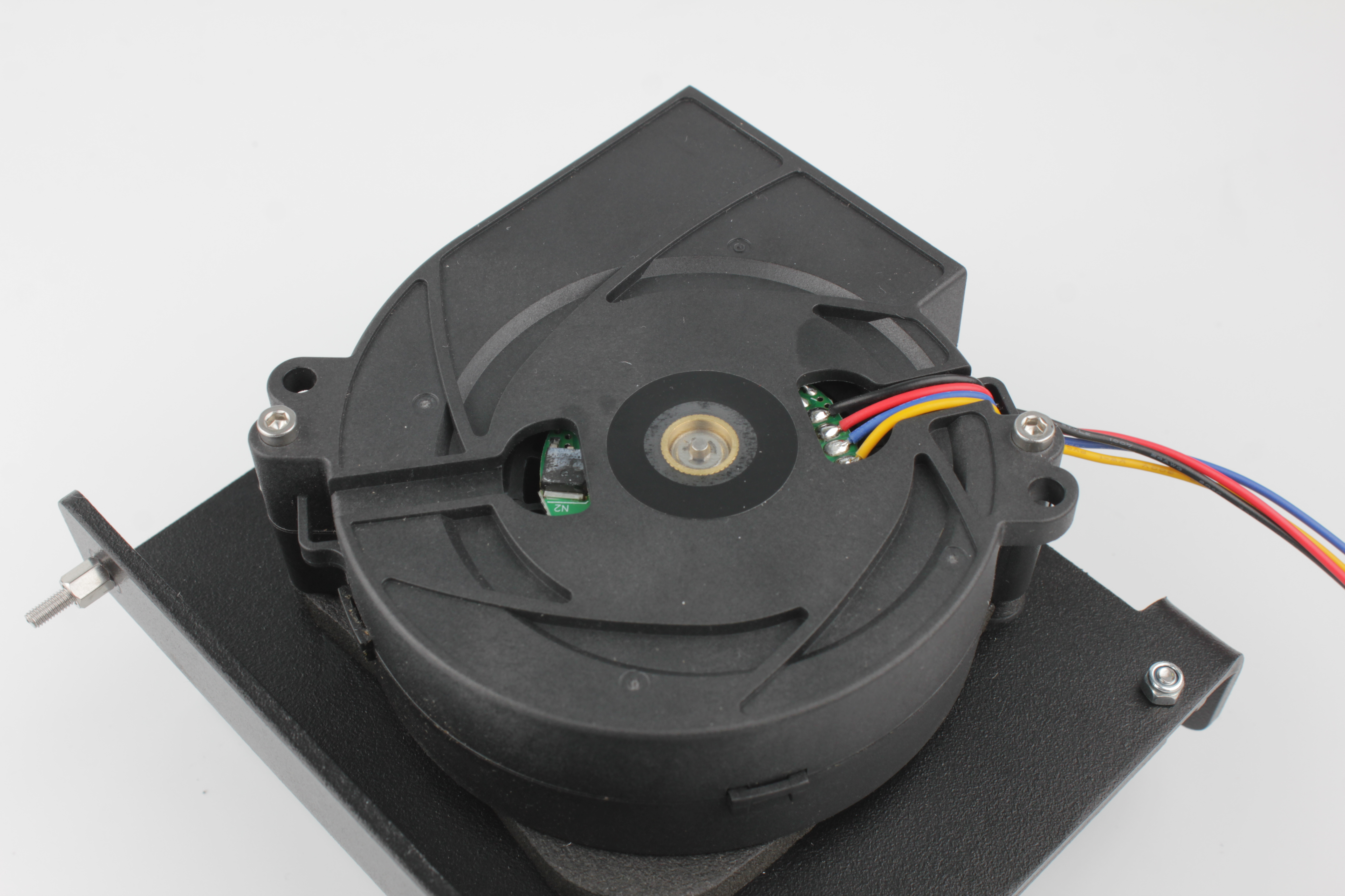 Fan mounting screws being removed with 2.5 mm hex