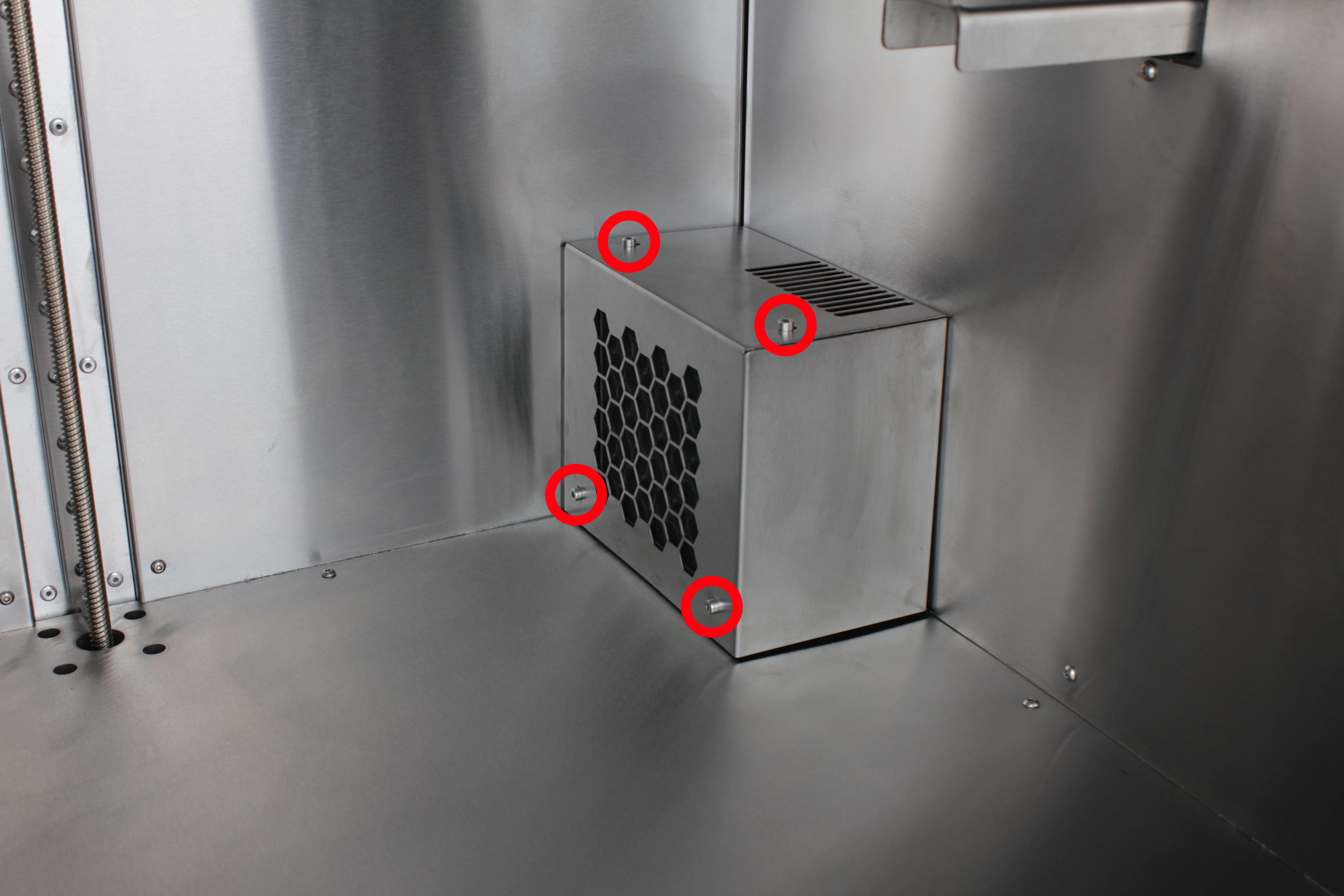 Stainless steel HEPA housing \u2014 four screws highlighted
