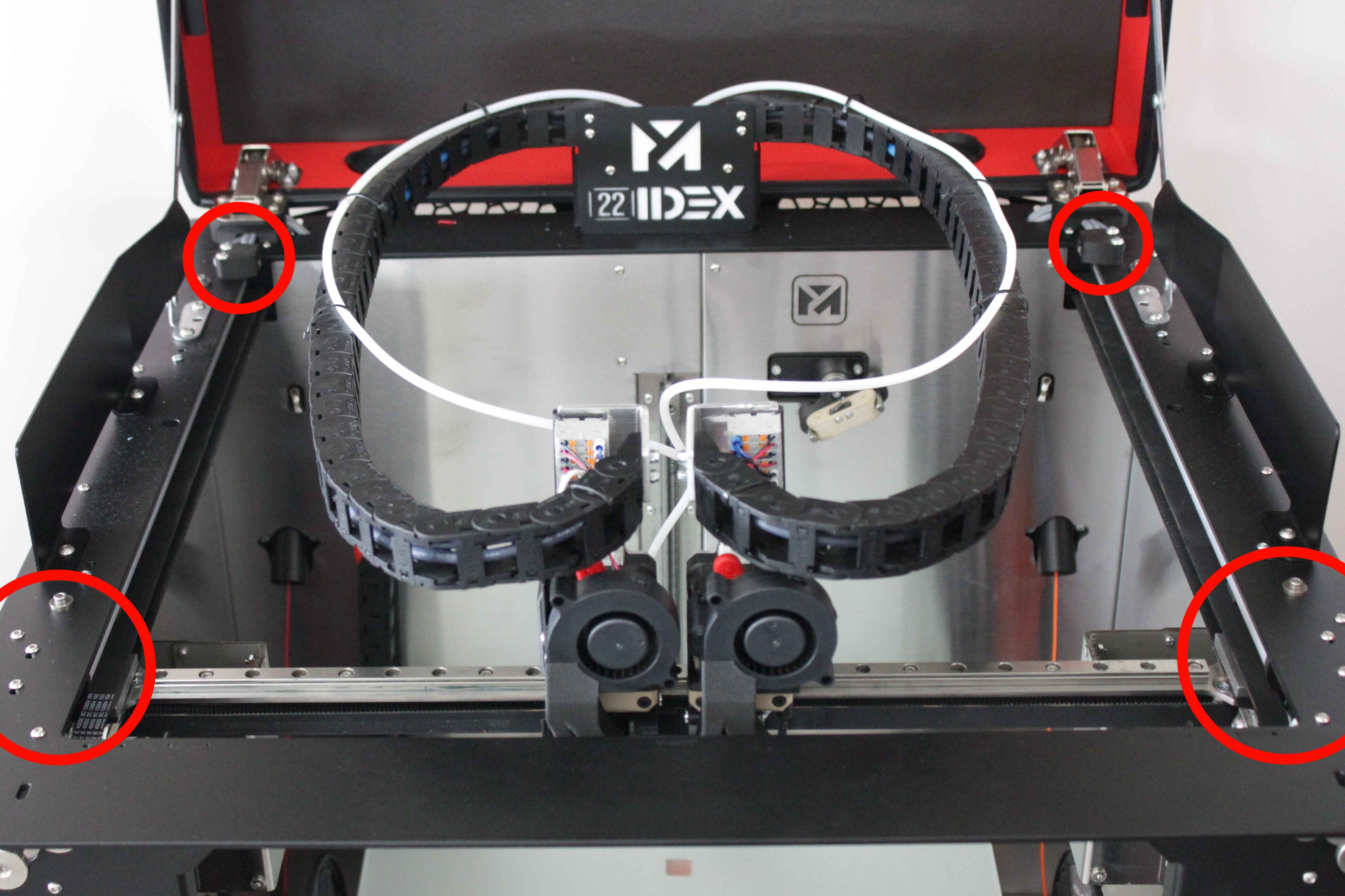 Angled top-down view of the gantry showing the X, U, Left Y, and Right Y axis endstop locations on the 22IDEX V4 (circled).