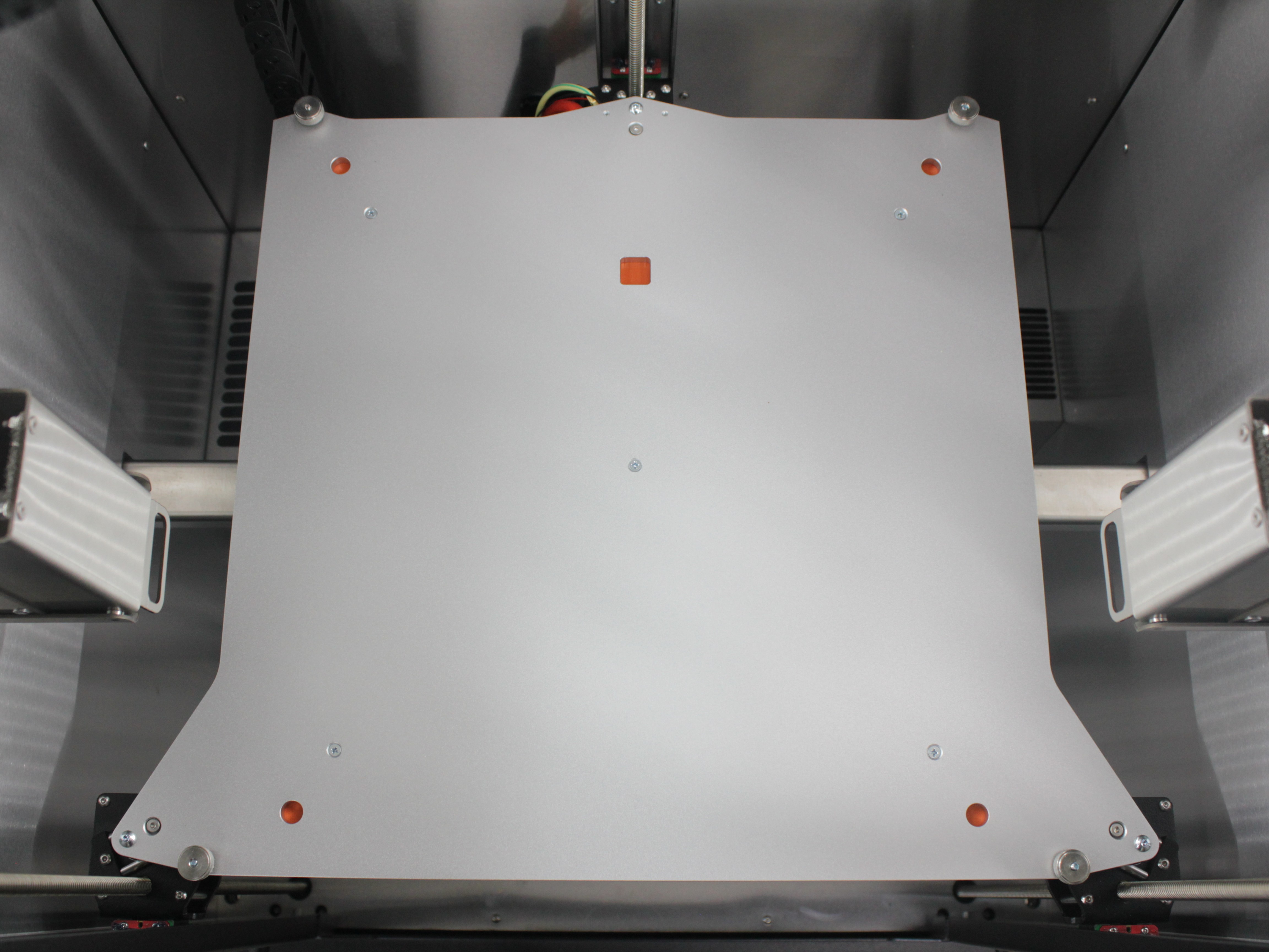 Build plate removed showing bare aluminum bed surface
