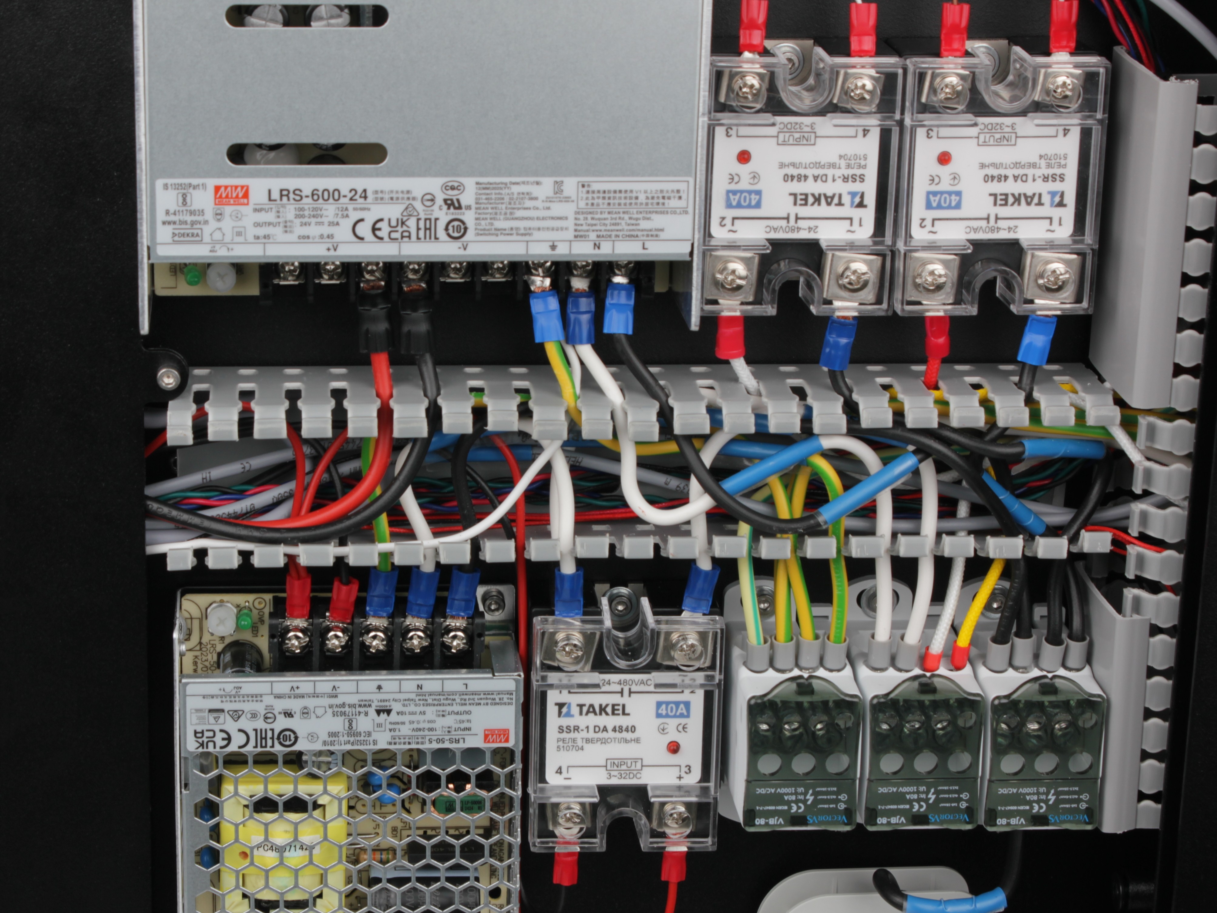 Cable channel with cover removed, wiring exposed