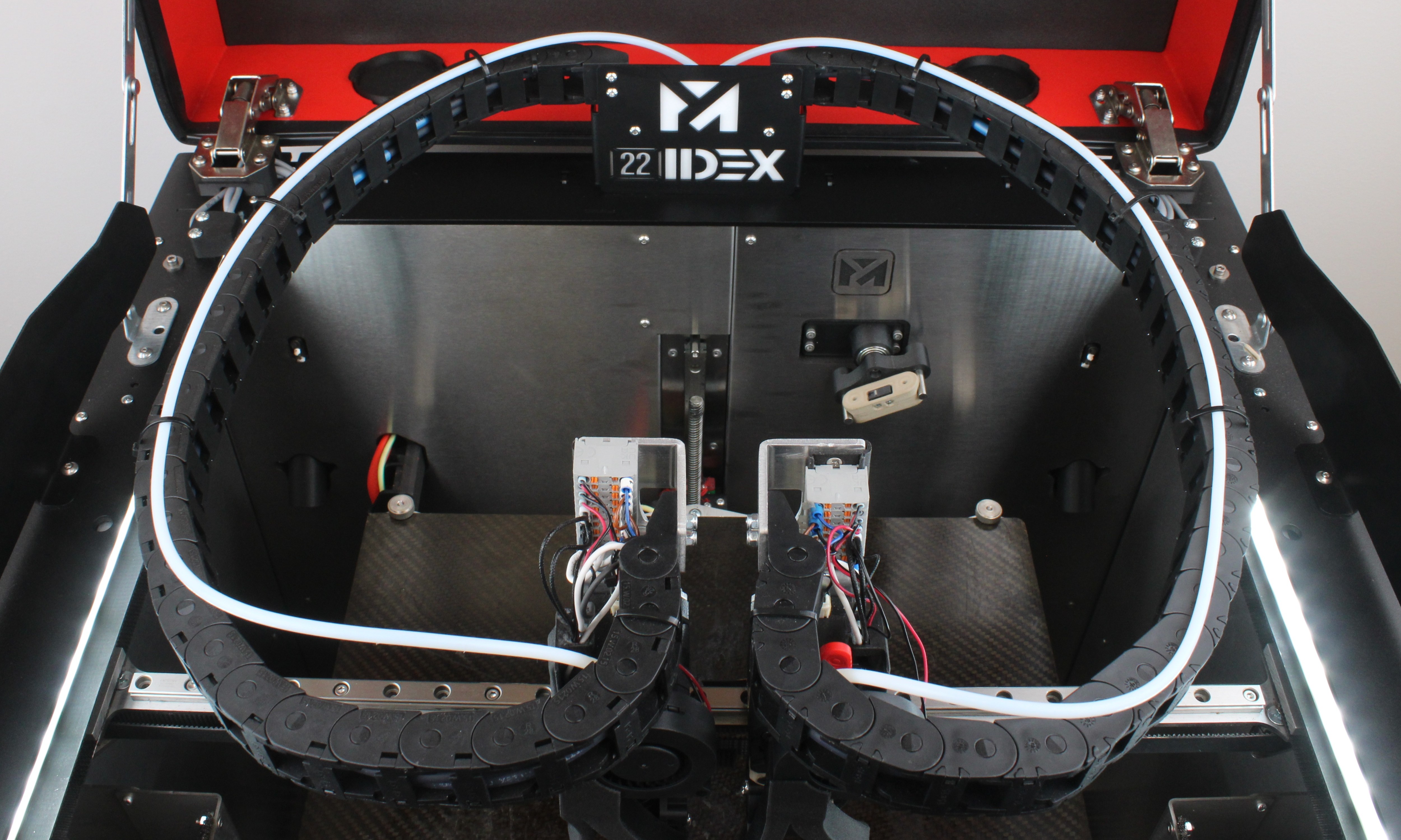 Front PTFE tubes riding on the cable chains from the upper portal to the extruders.