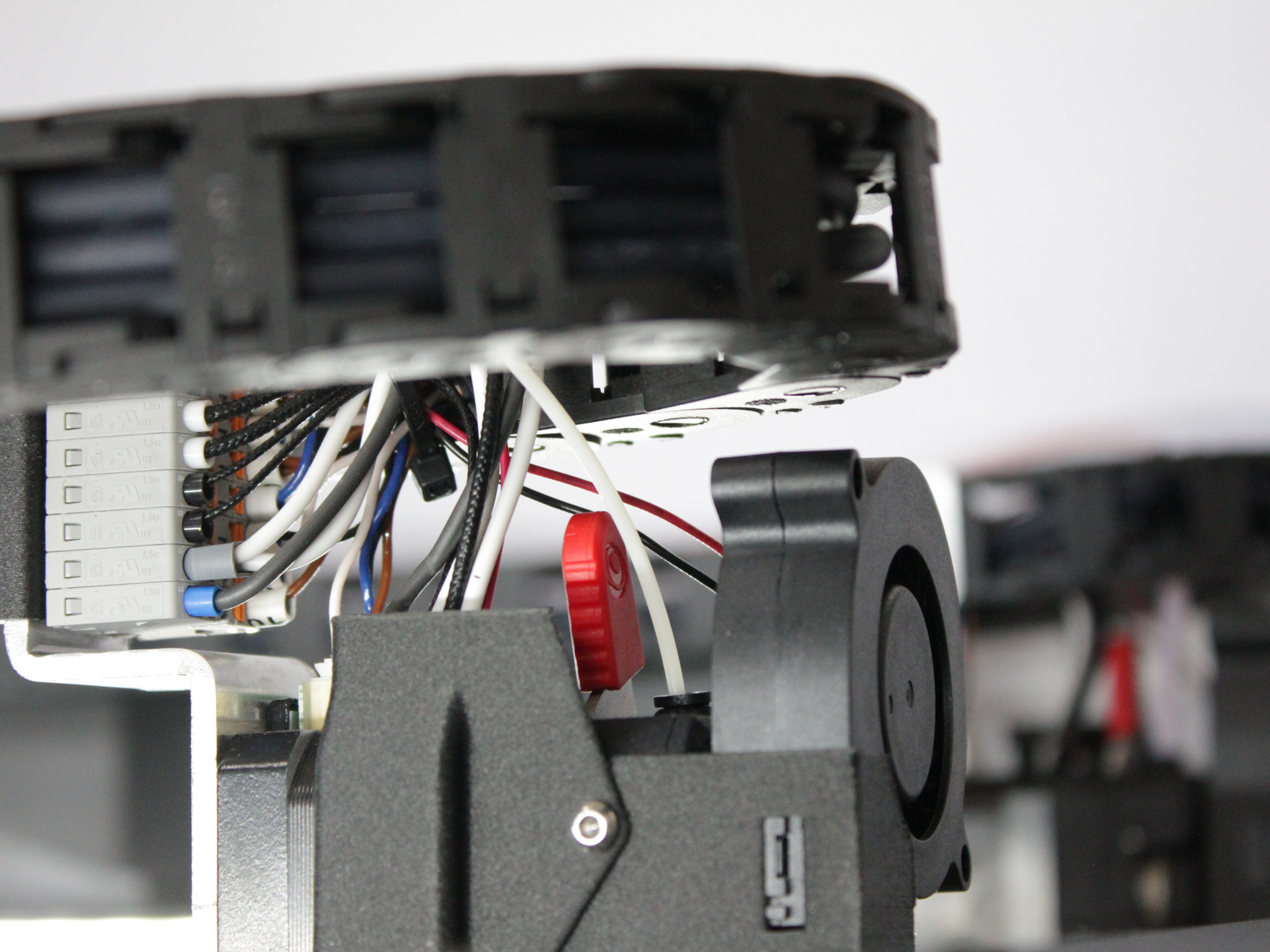 Filament visible coming out of the extruder assembly