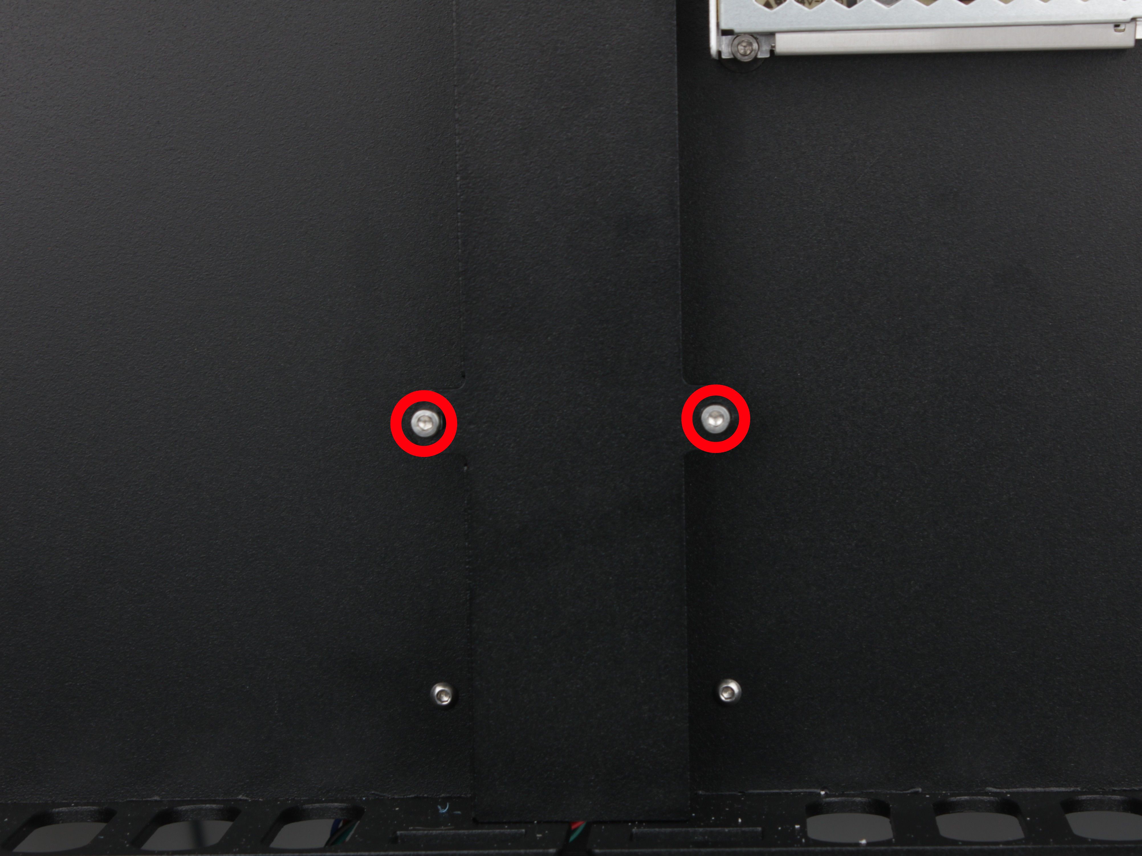 Lower screws on the vertical cable channel cover