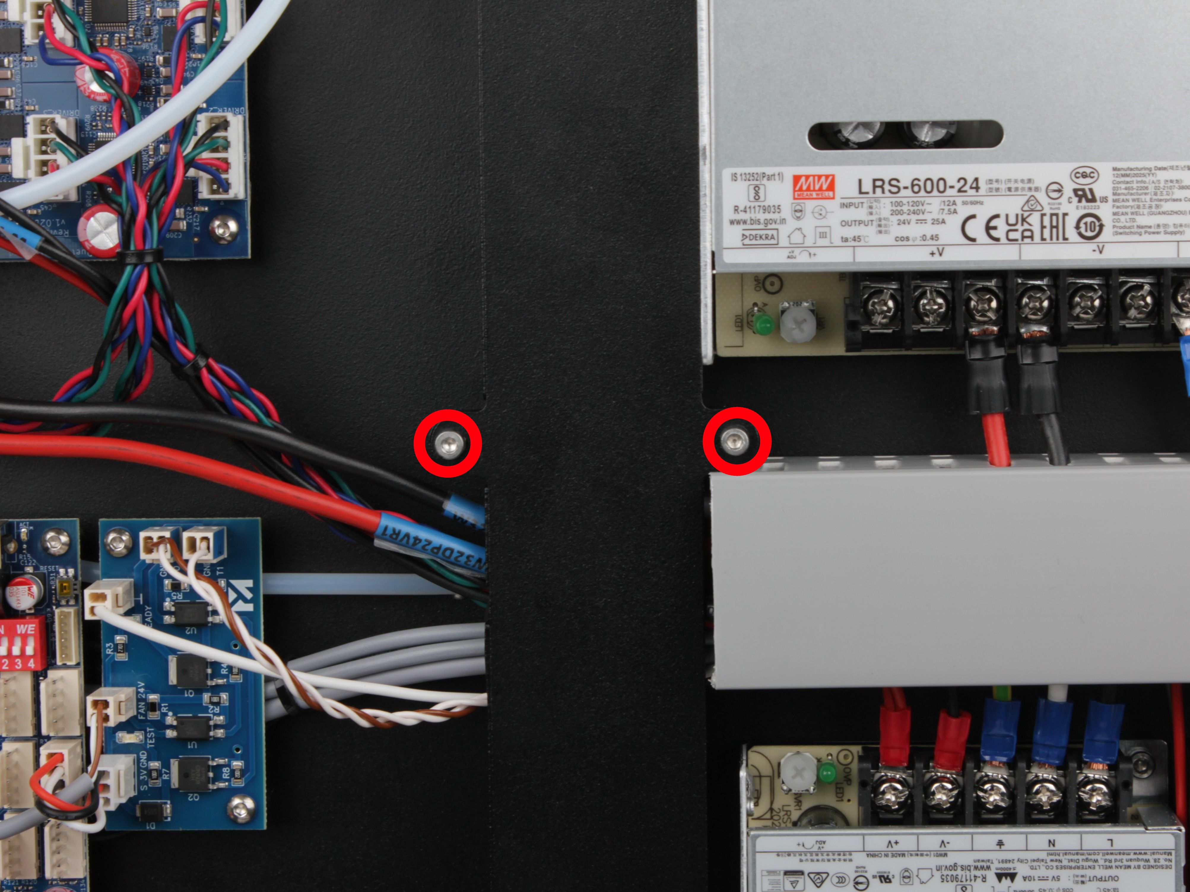 Middle screws on the vertical cable channel cover