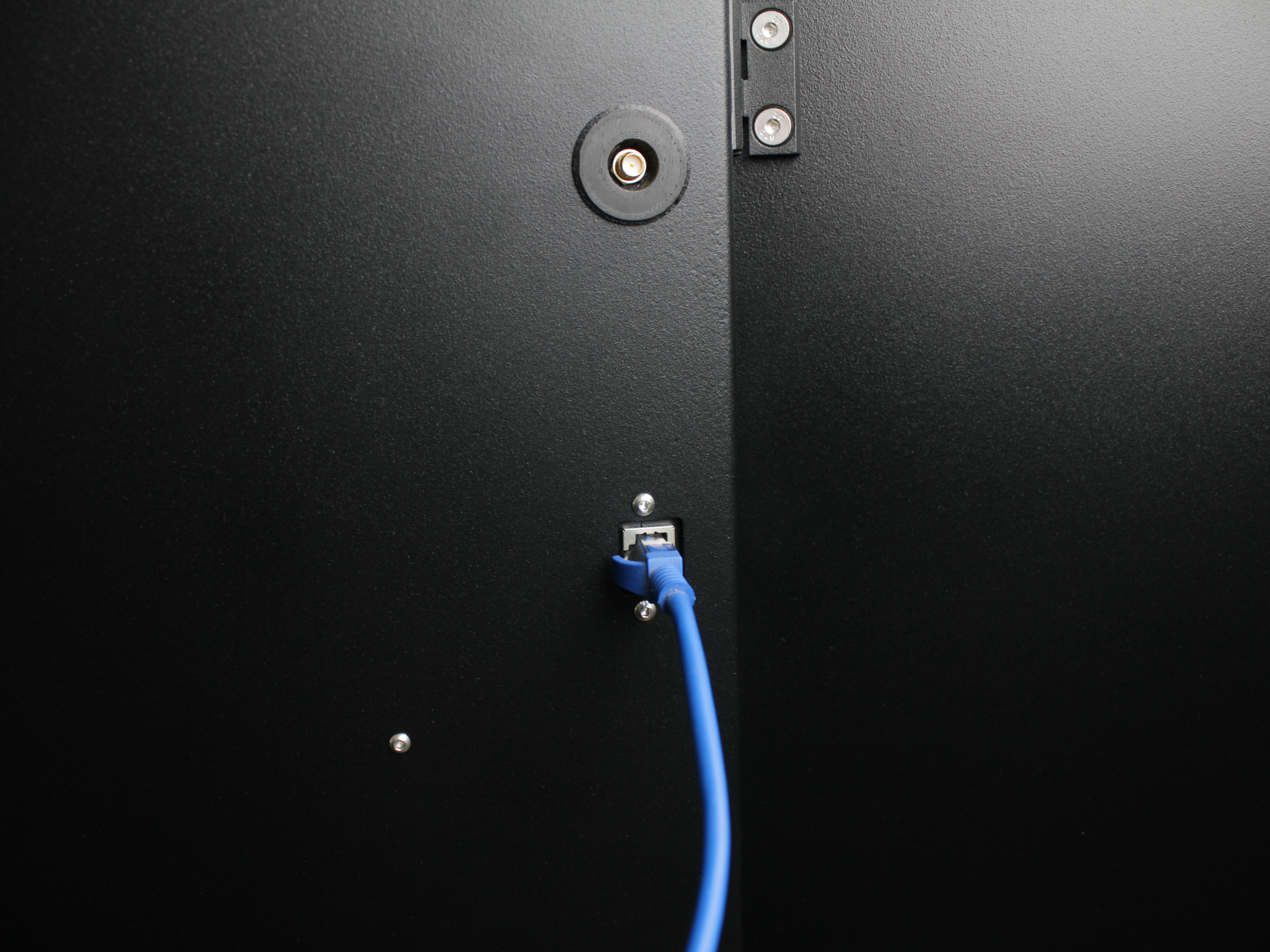 Ethernet cable connected at printer exterior