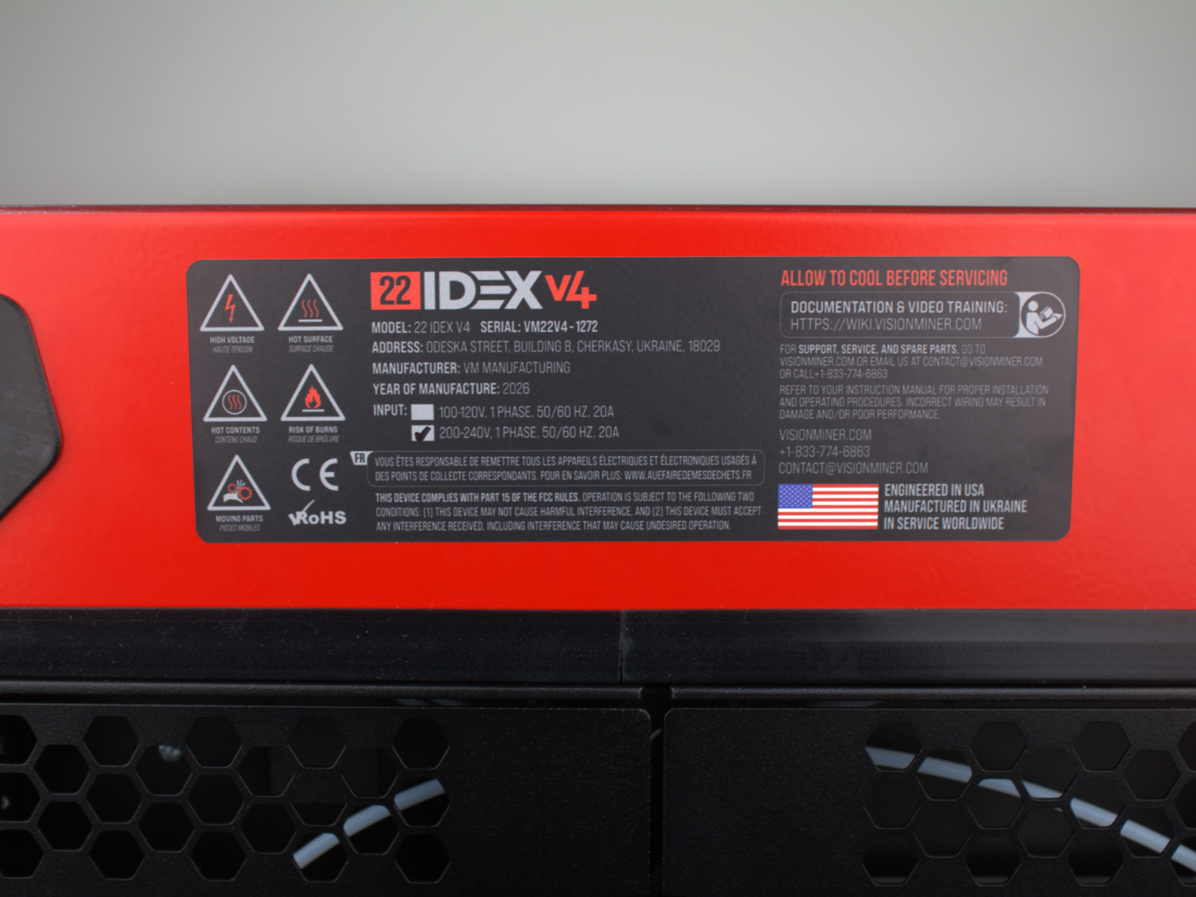 Safety warning labels on rear panel of Vision Miner 22IDEX V4