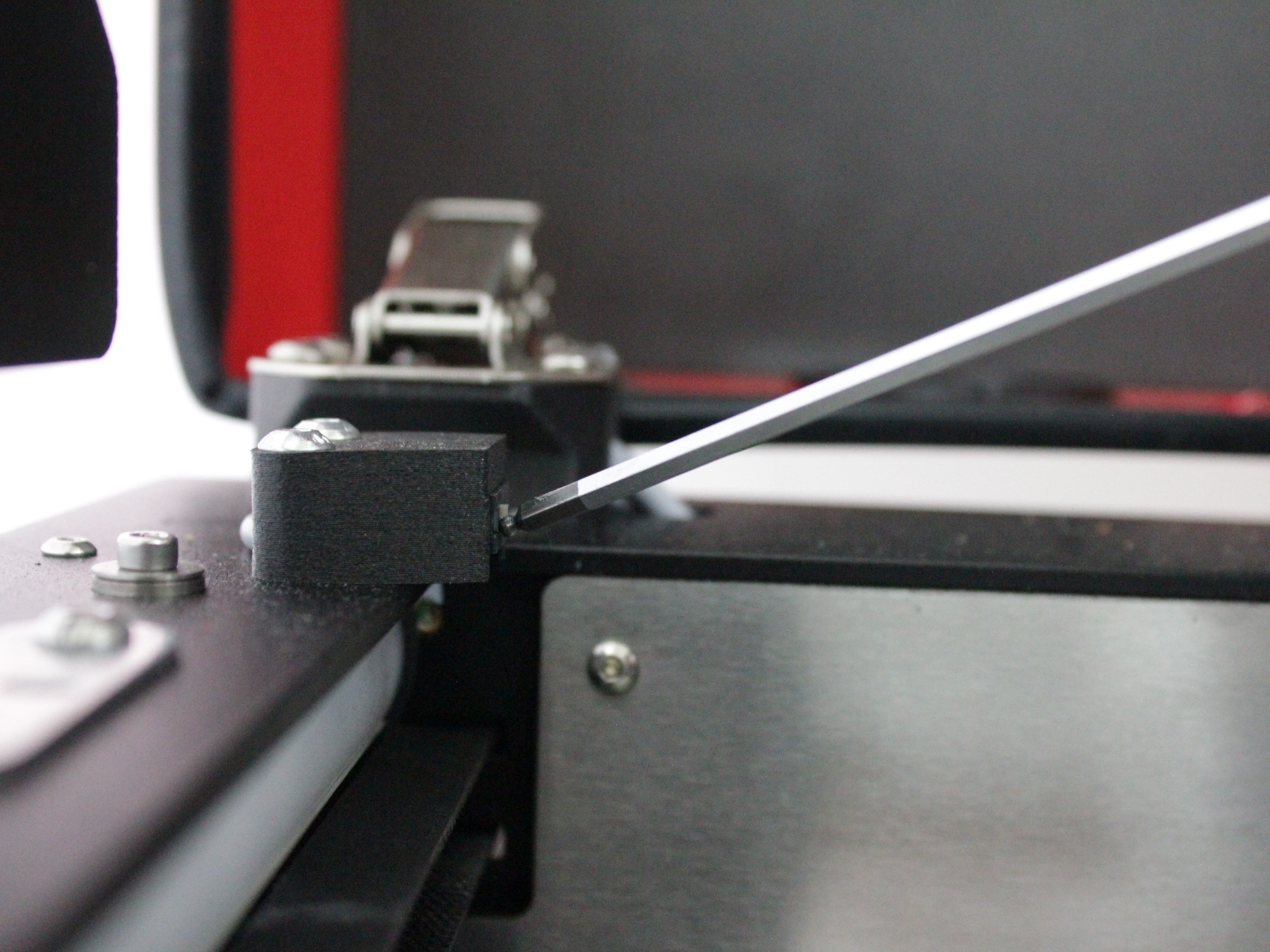 Pressing X-axis endstop switch during test.