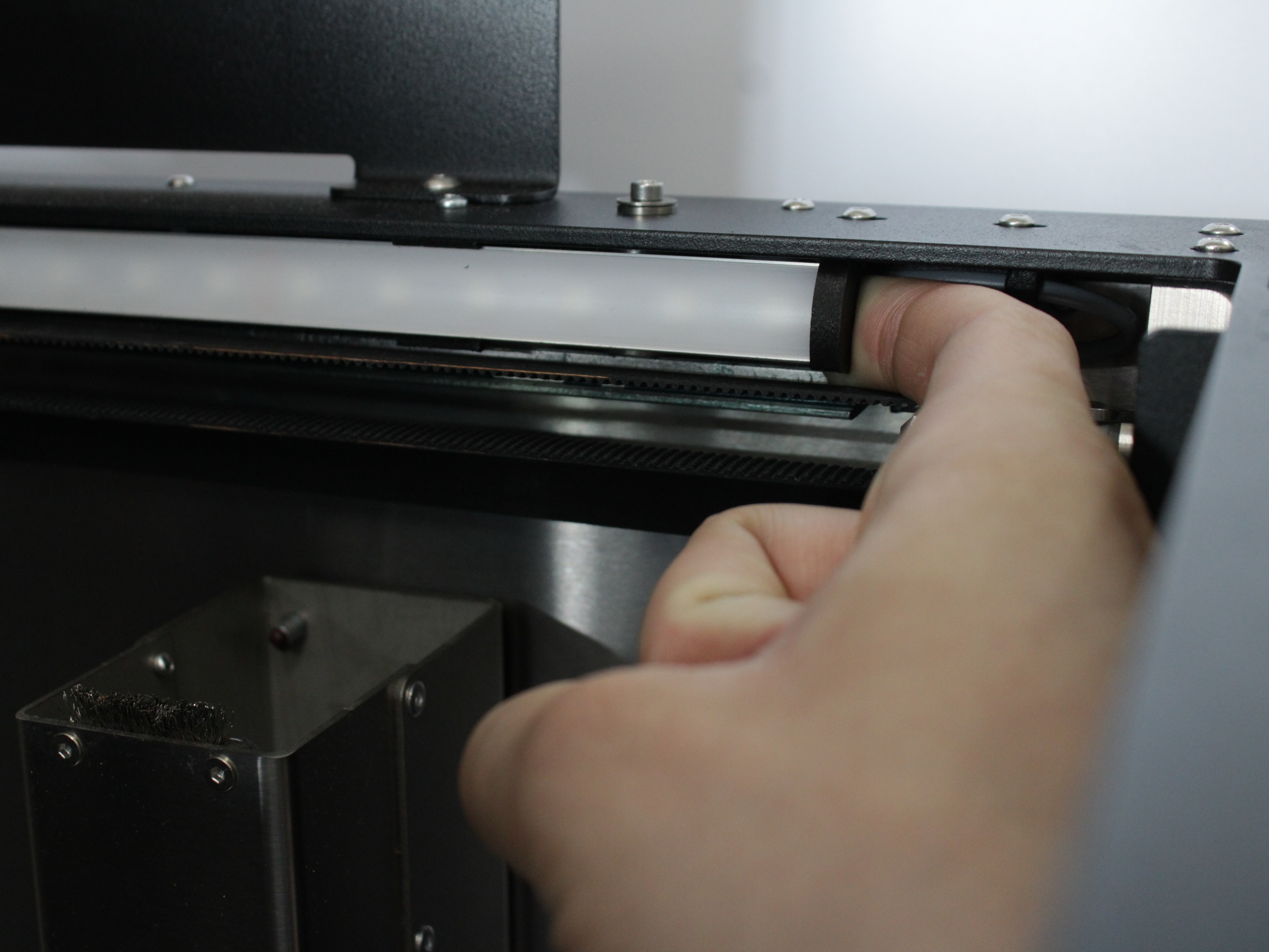 Removing LED from clip to expose crossbar cylinder