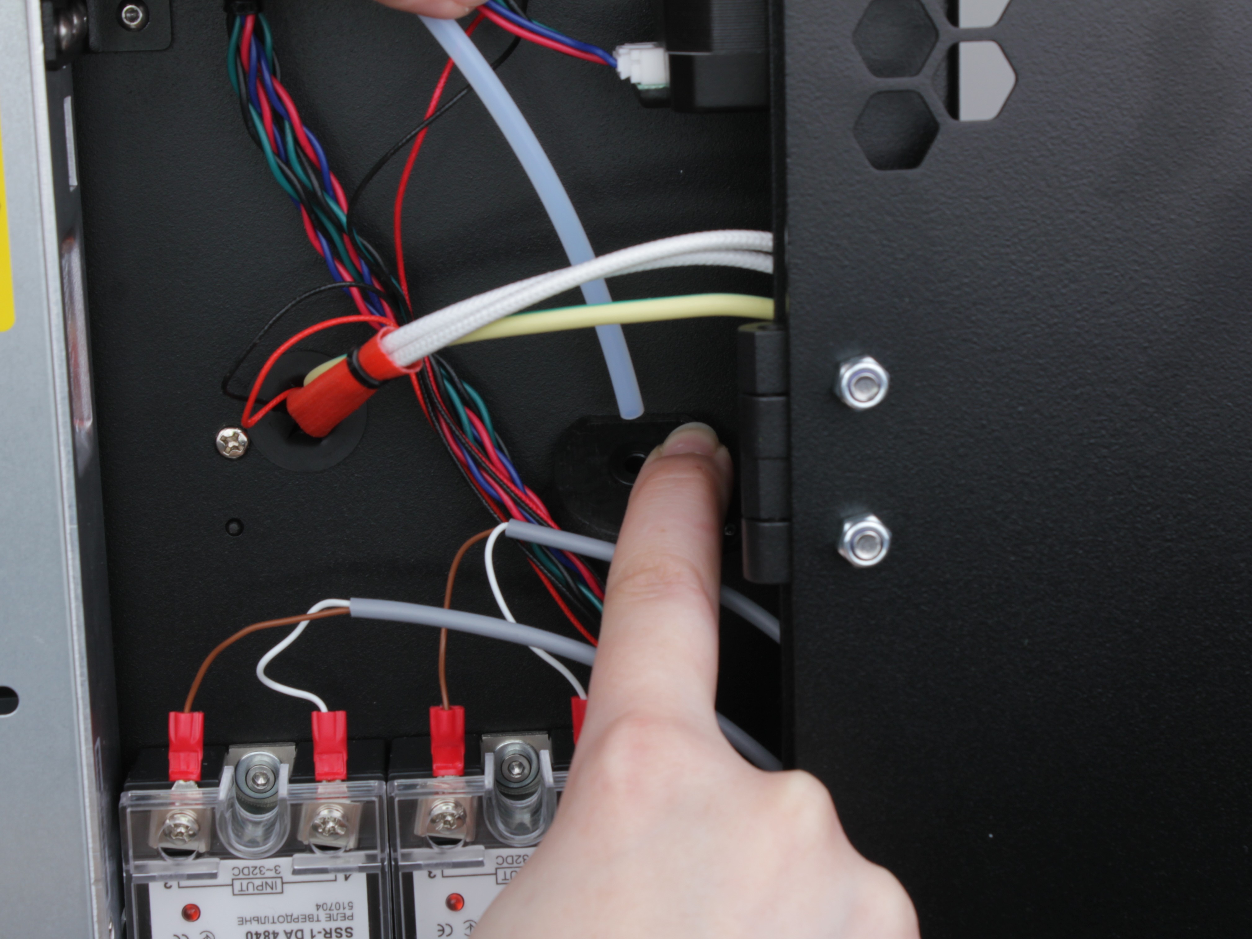 T0 filament tube being removed from the tube holder