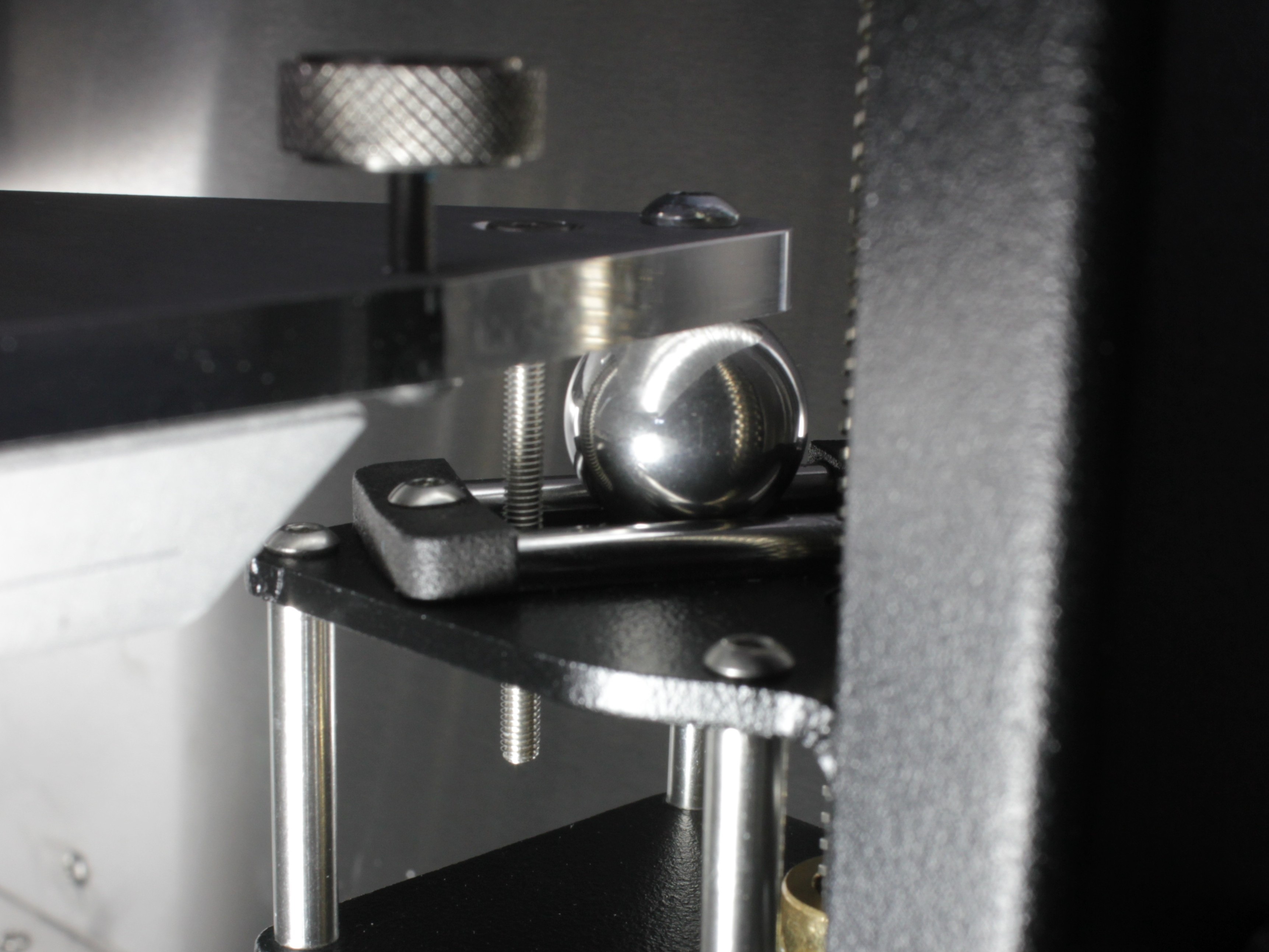 Steel ball attached to the underside of the bed. Each of the three support points has one ball.