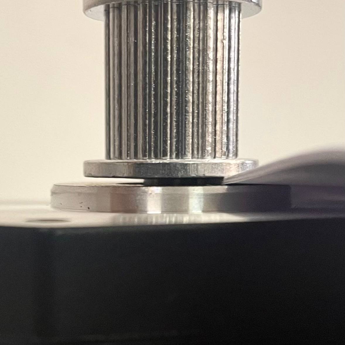 Pulley slid off old motor shaft showing position reference.