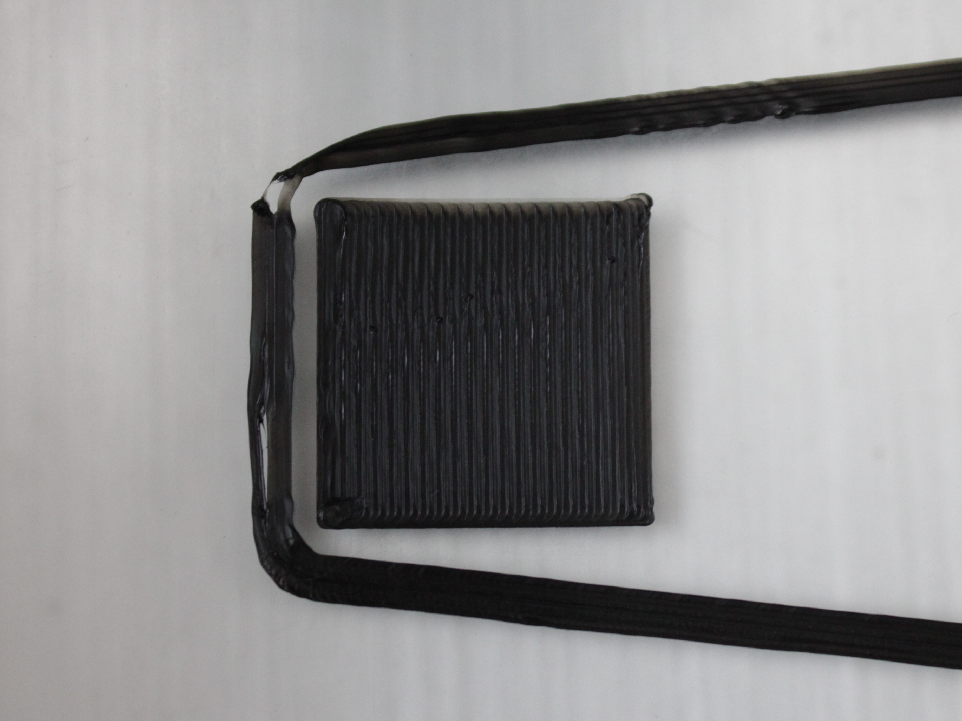 First layer too low on one side – filament buildup and over-squish
