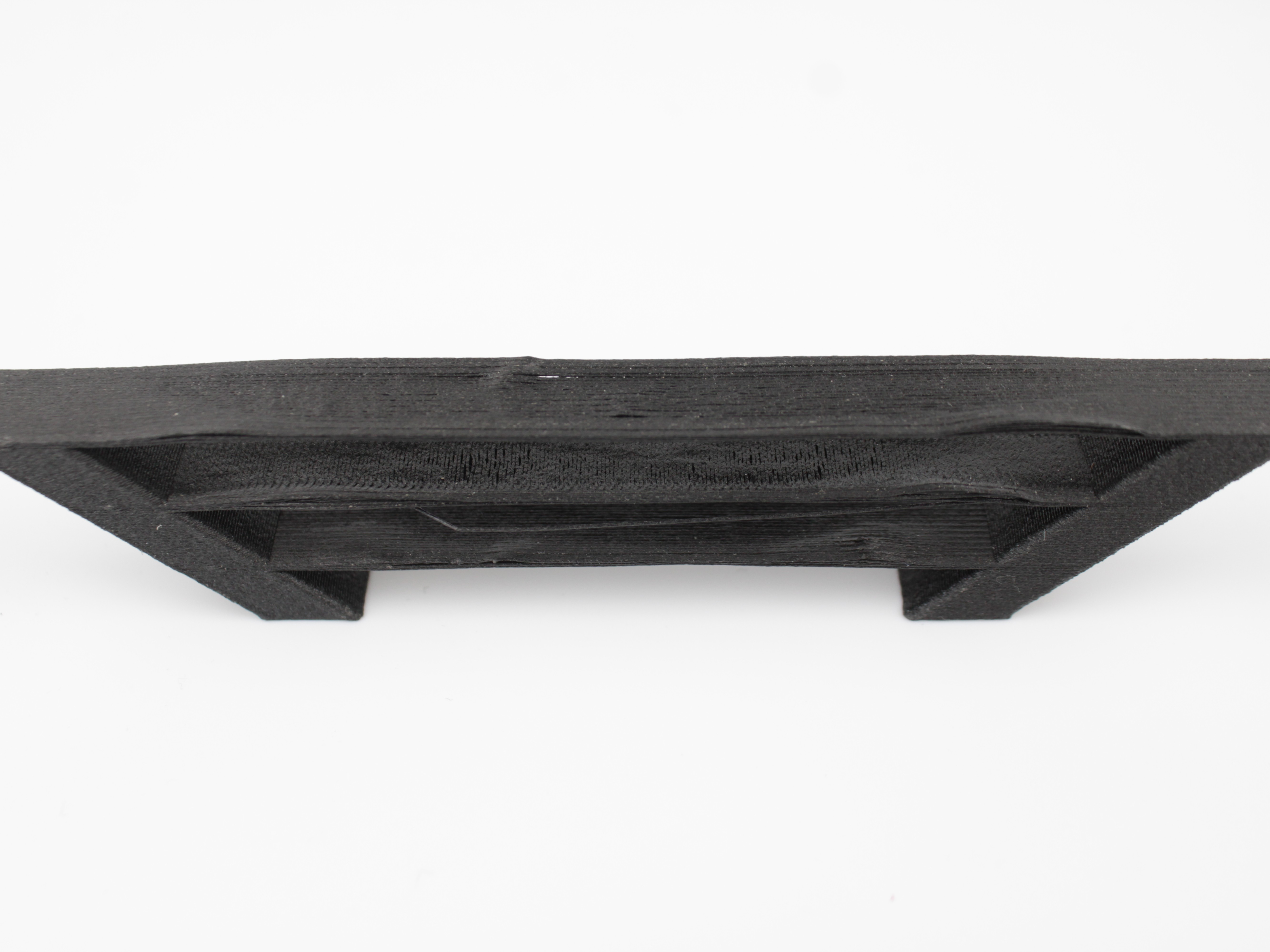 Bridge with rough, uneven top surface caused by weak foundation layer