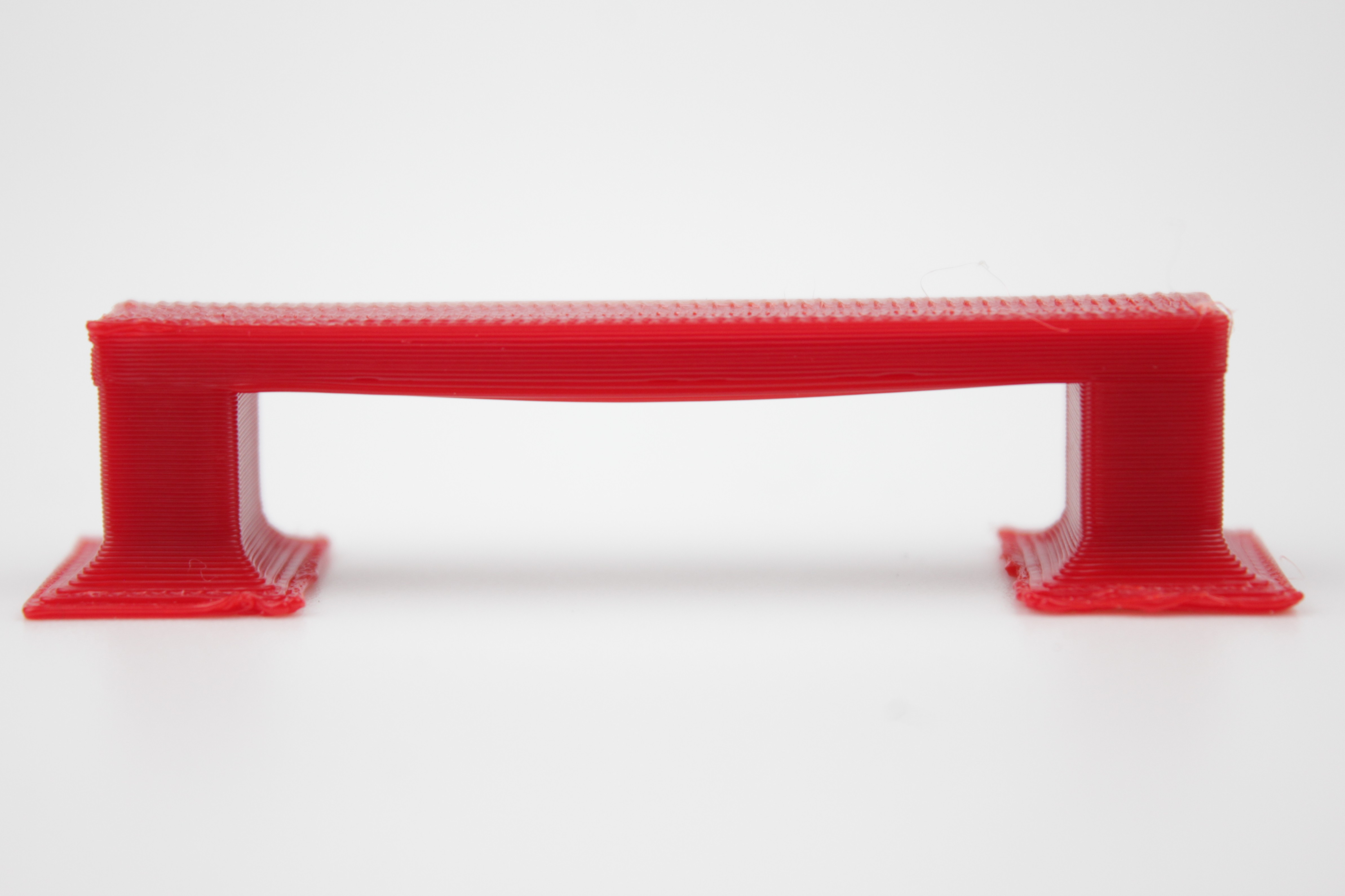 Bridging test print after tuning, with a straight bridge and a clean top surface