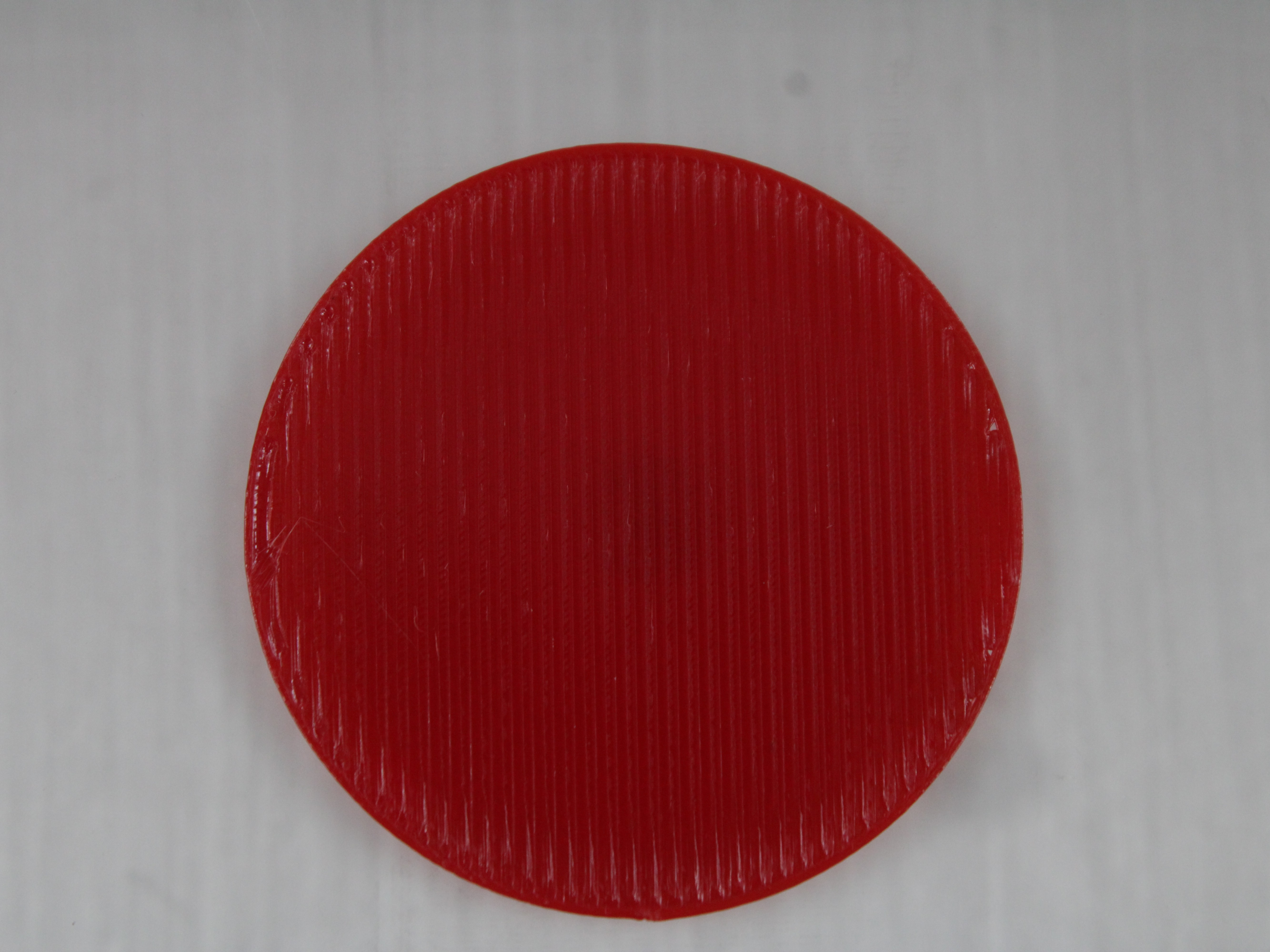First layer printed with a wide line width, showing solidly fused first-layer lines