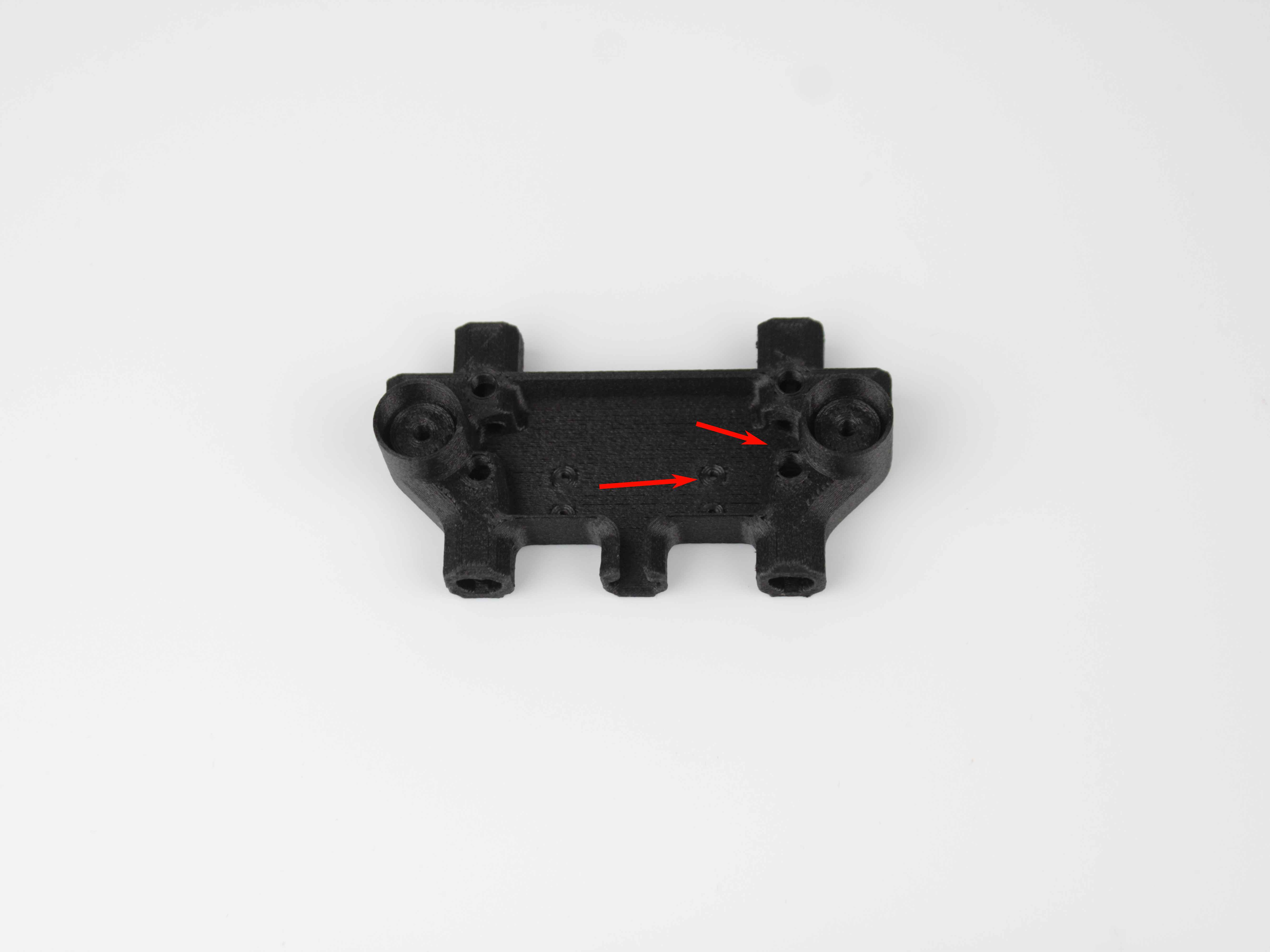 3D-printed filament sensor housing, showing the area where the ball roller contacts and wears.