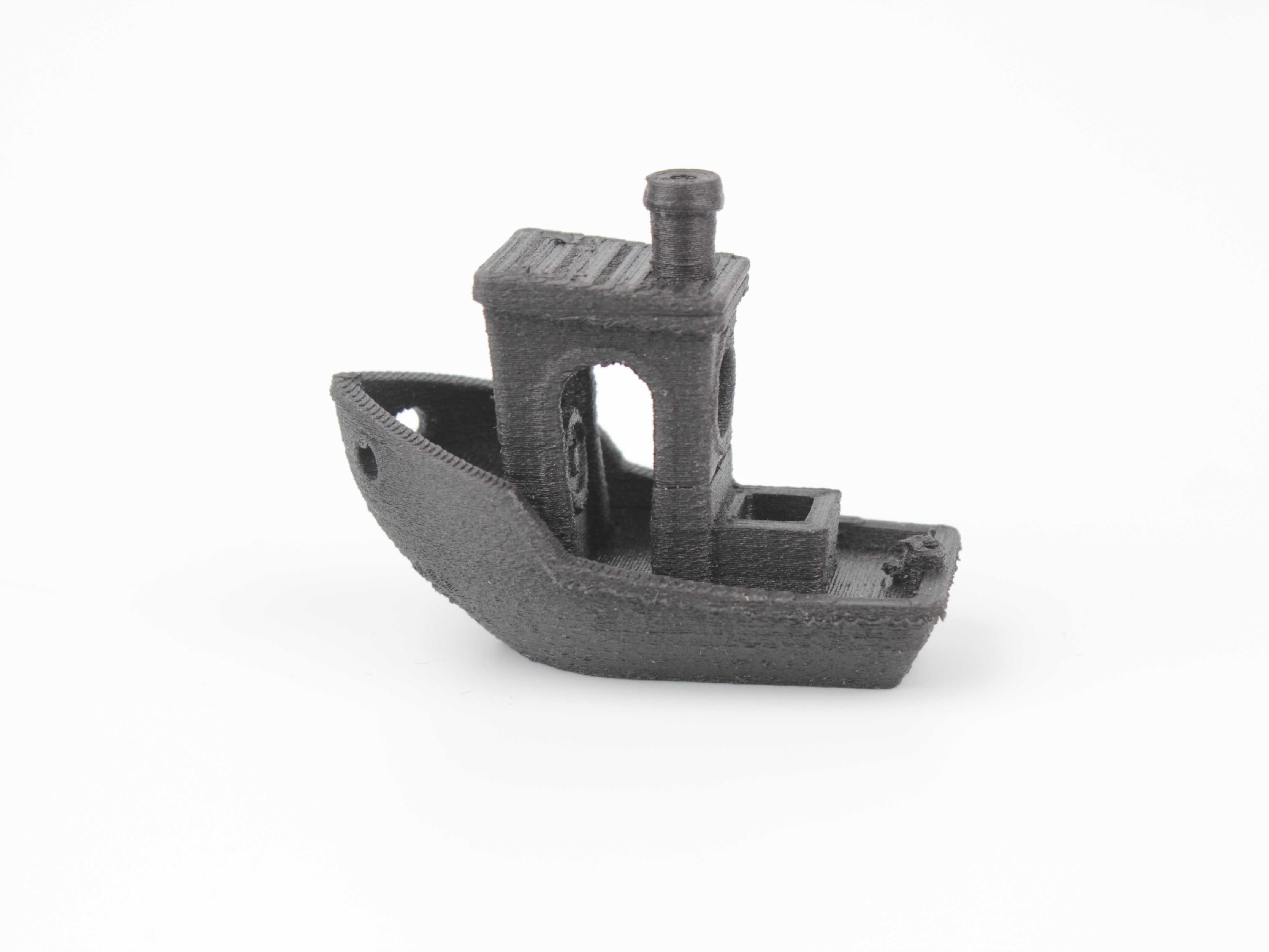 Part printed with wet filament showing defects