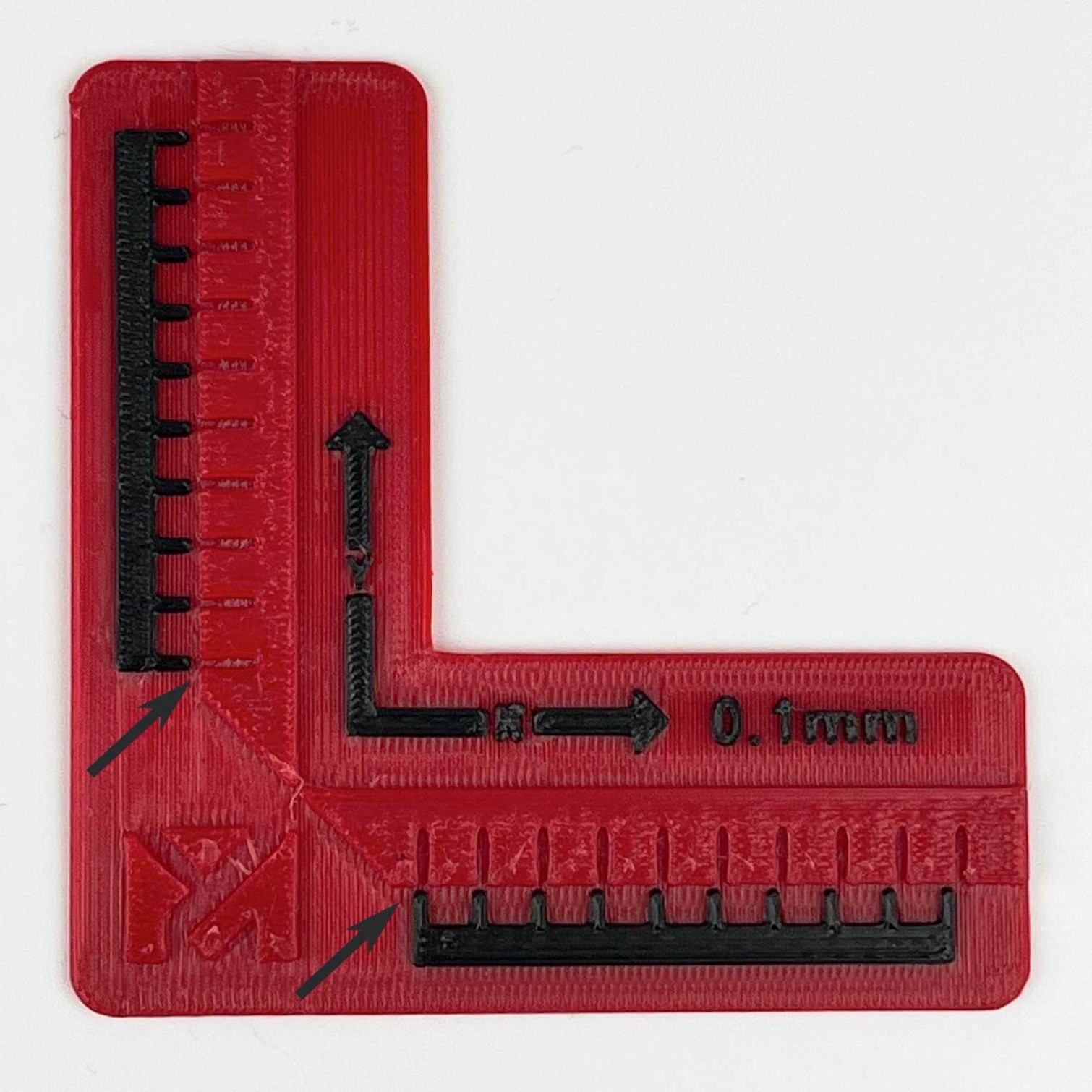 Linear Alignment Test print before correction - black T1 scale offset from the red T0 graduations