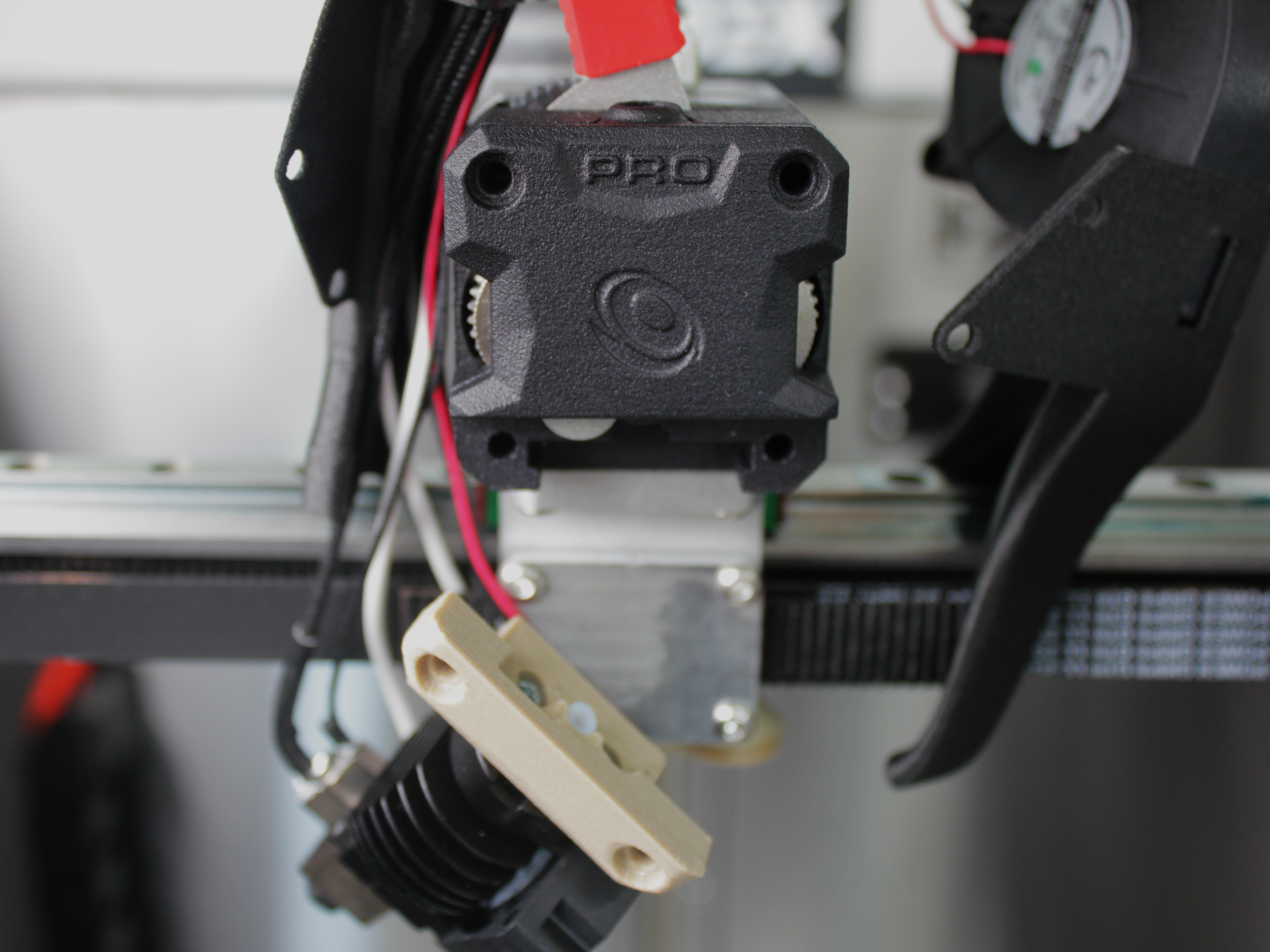 Radiator adapter bracket pulled away from extruder body