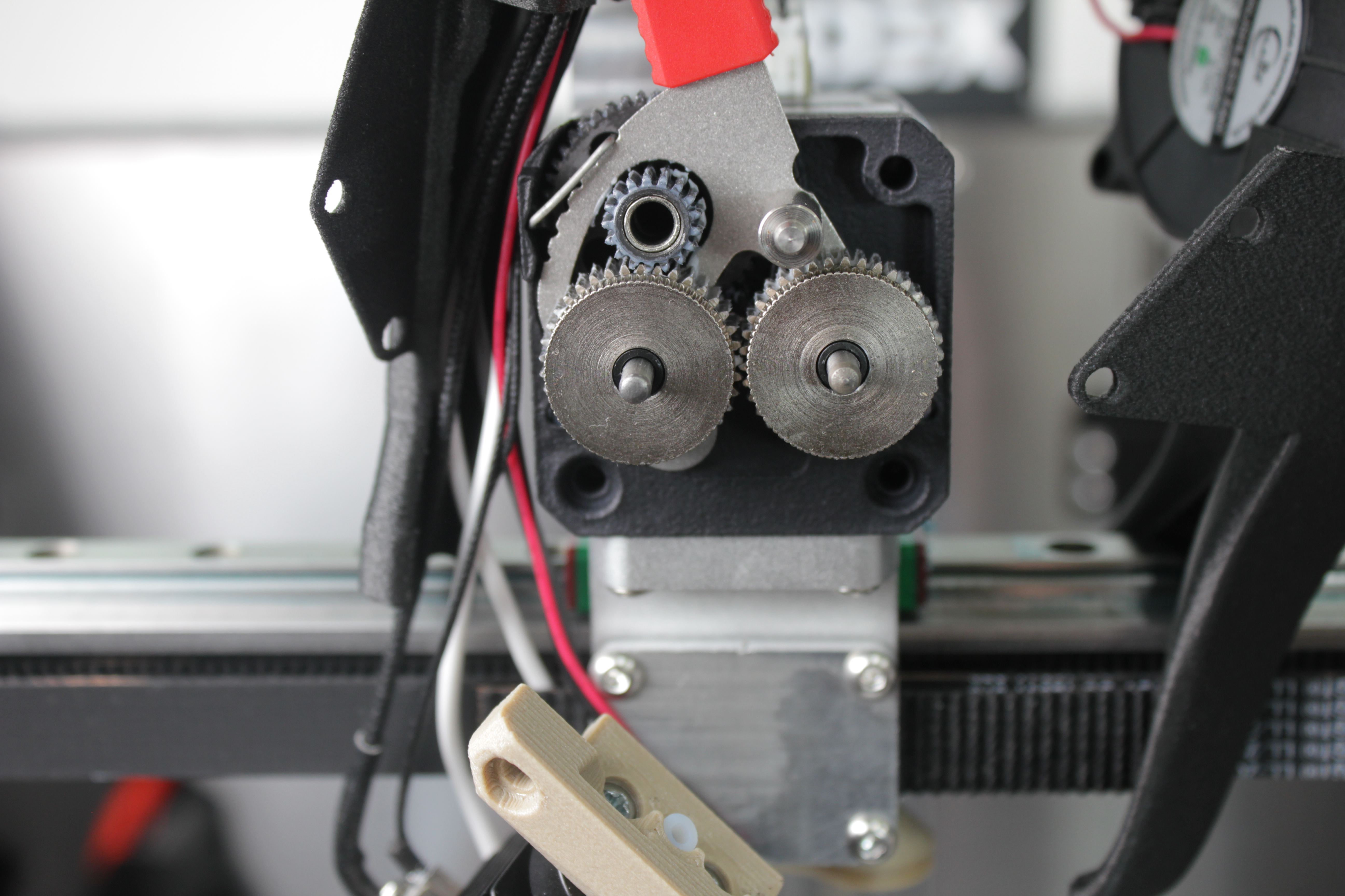 Inspecting and cleaning the extruder drive gears