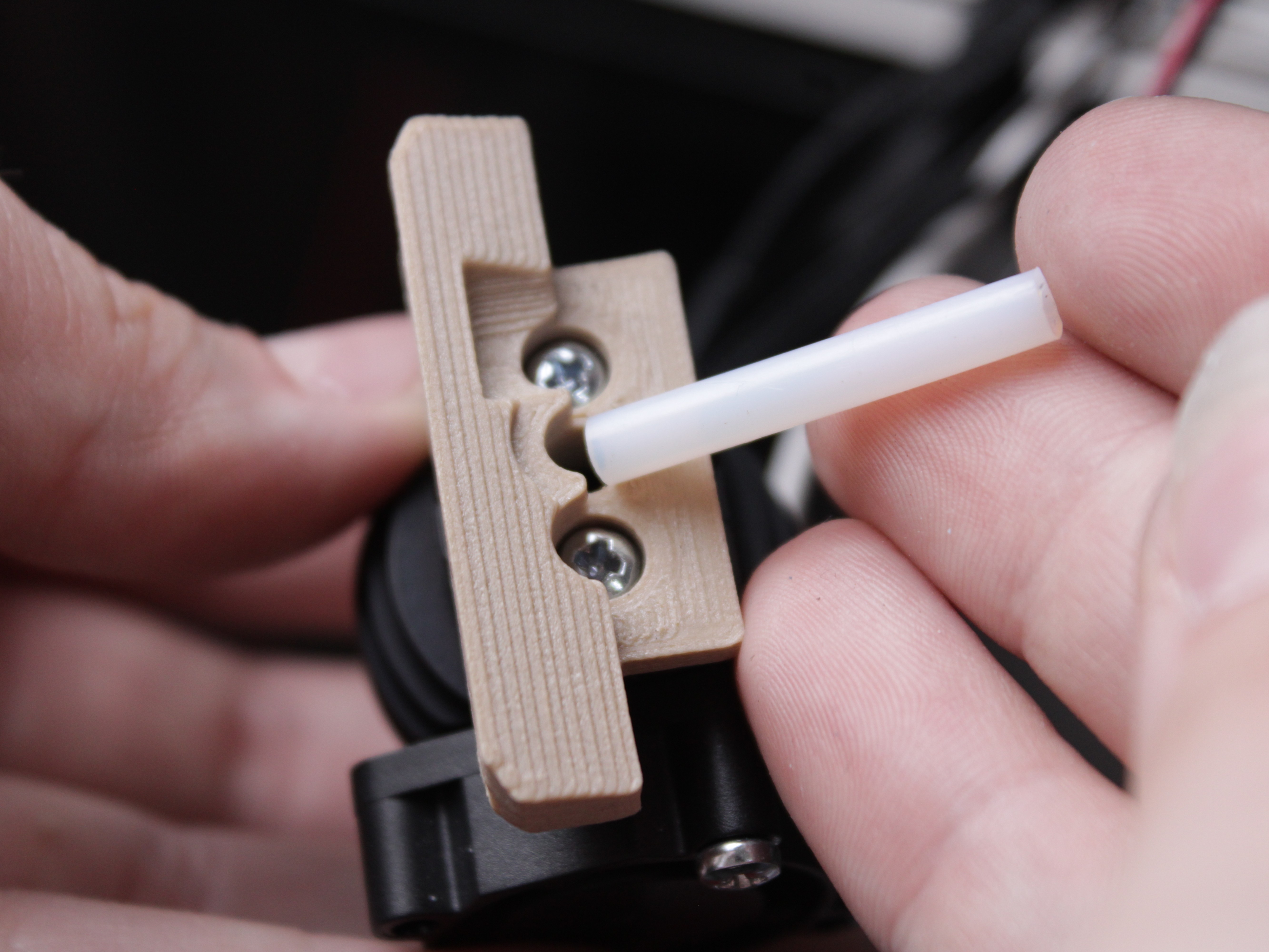 Removing the PTFE tube from the interface plate