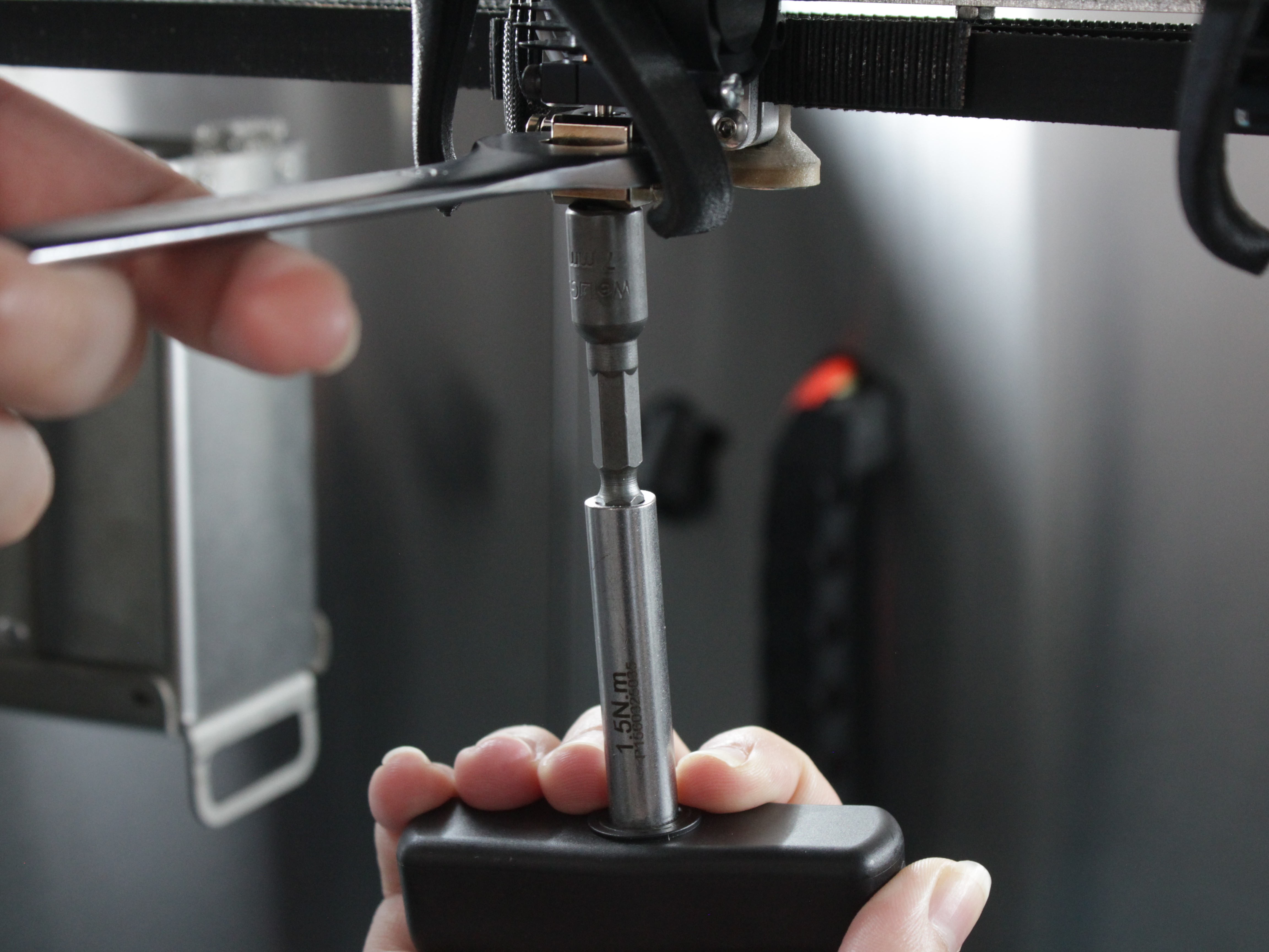 Removing nozzle while holding heat block with wrench