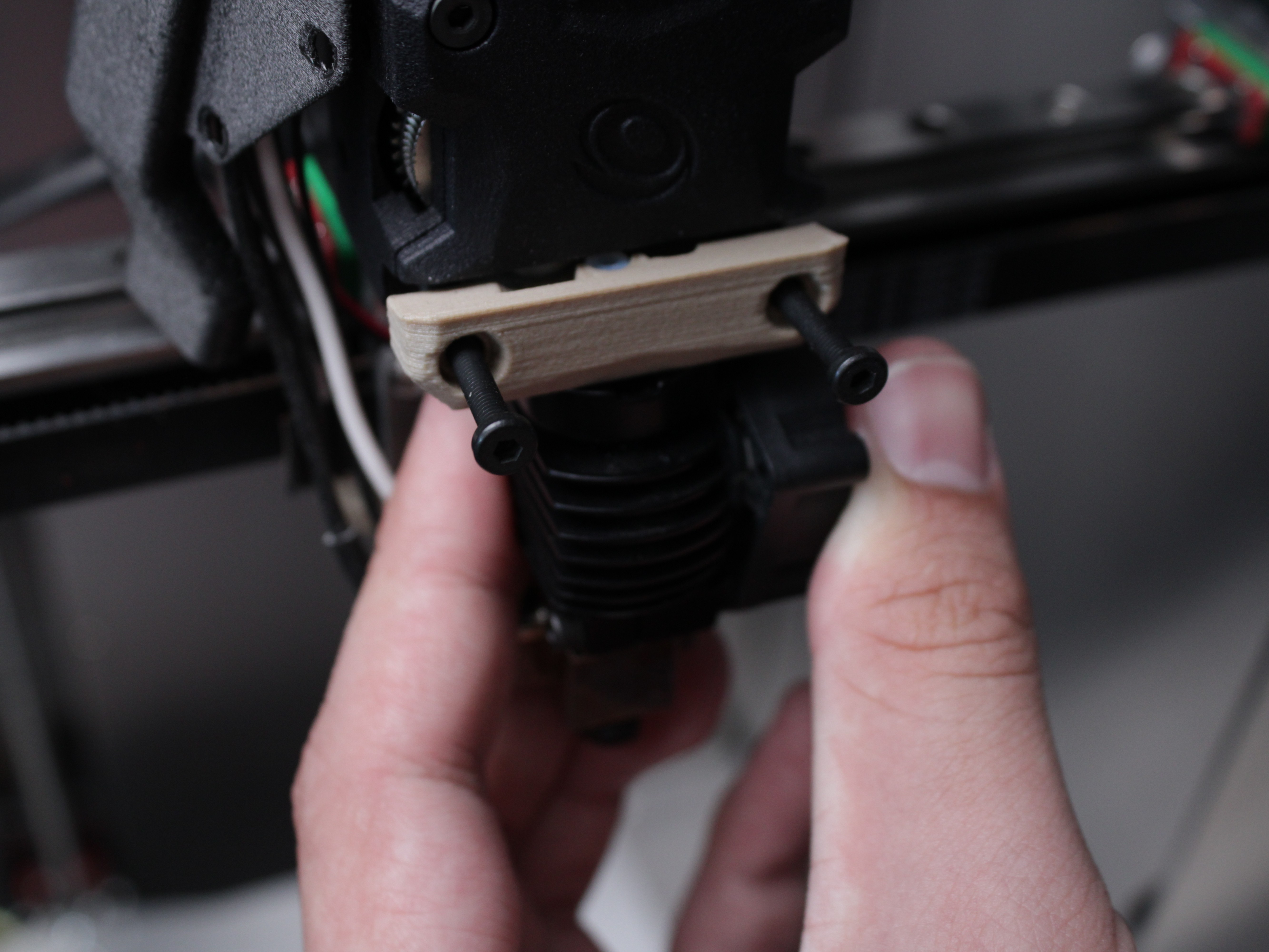 Hotend assembly being slid out of extruder