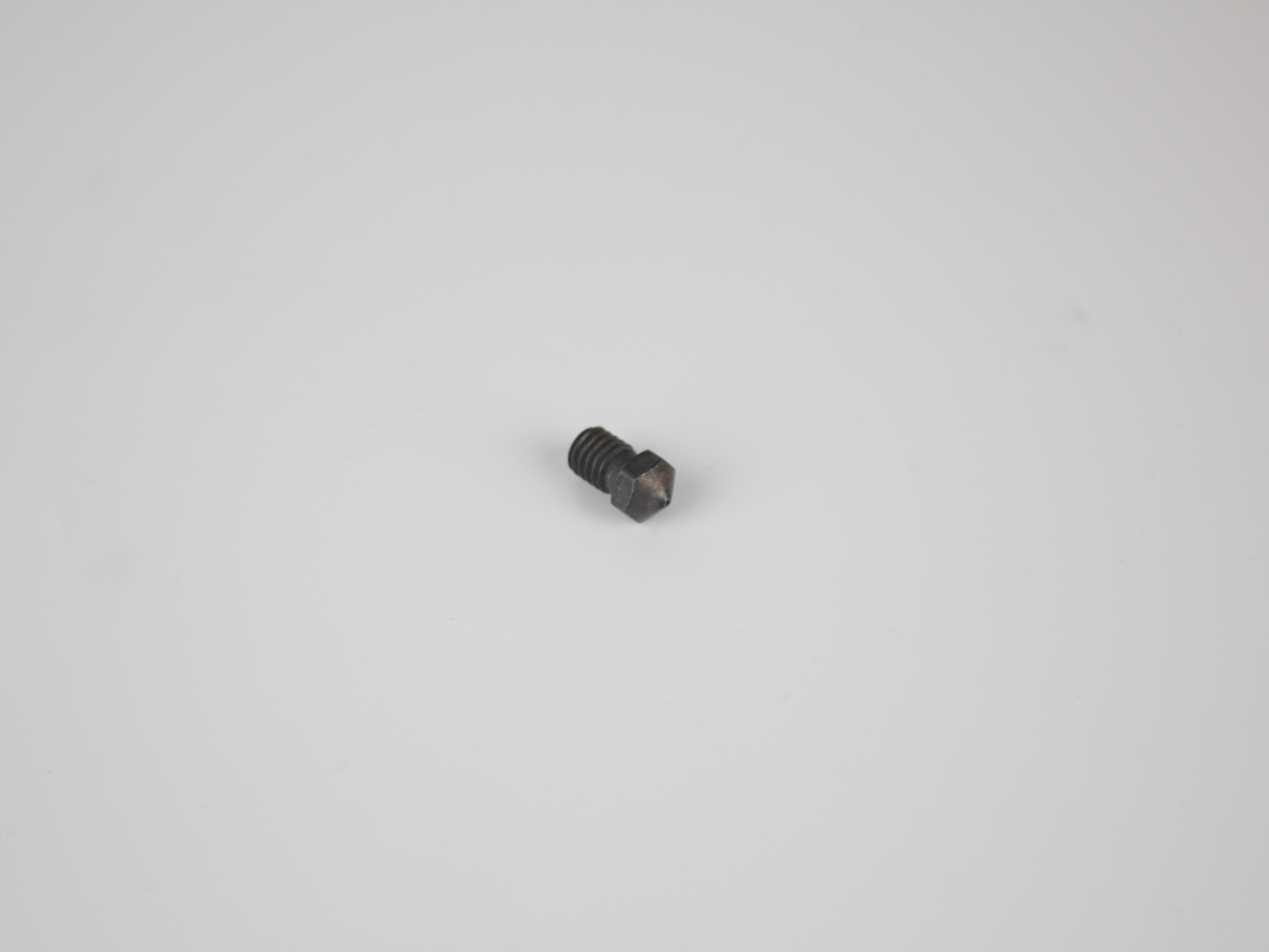 Removed nozzle on heat-resistant surface