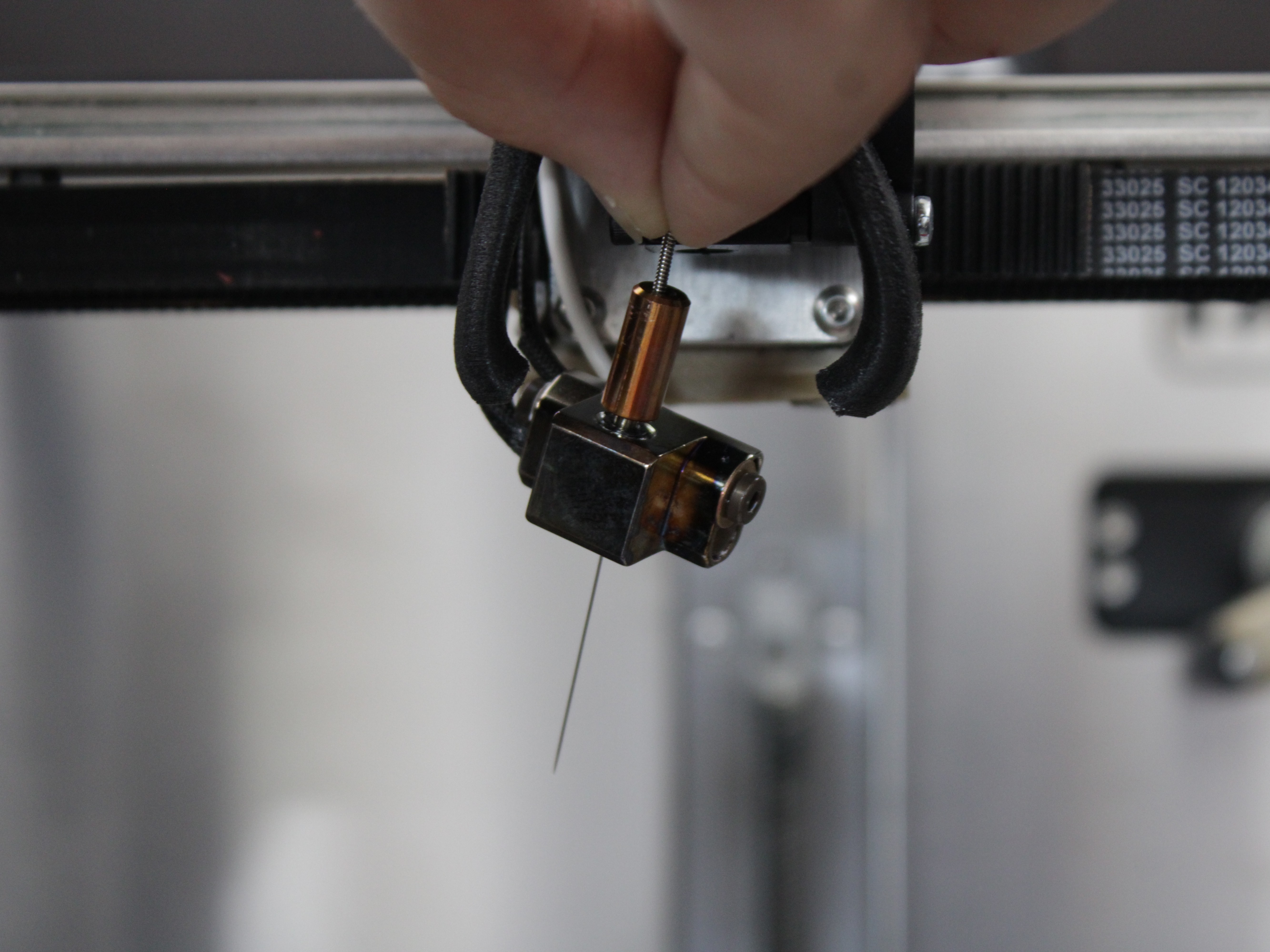 Inserting steel rod from top to clear blockage