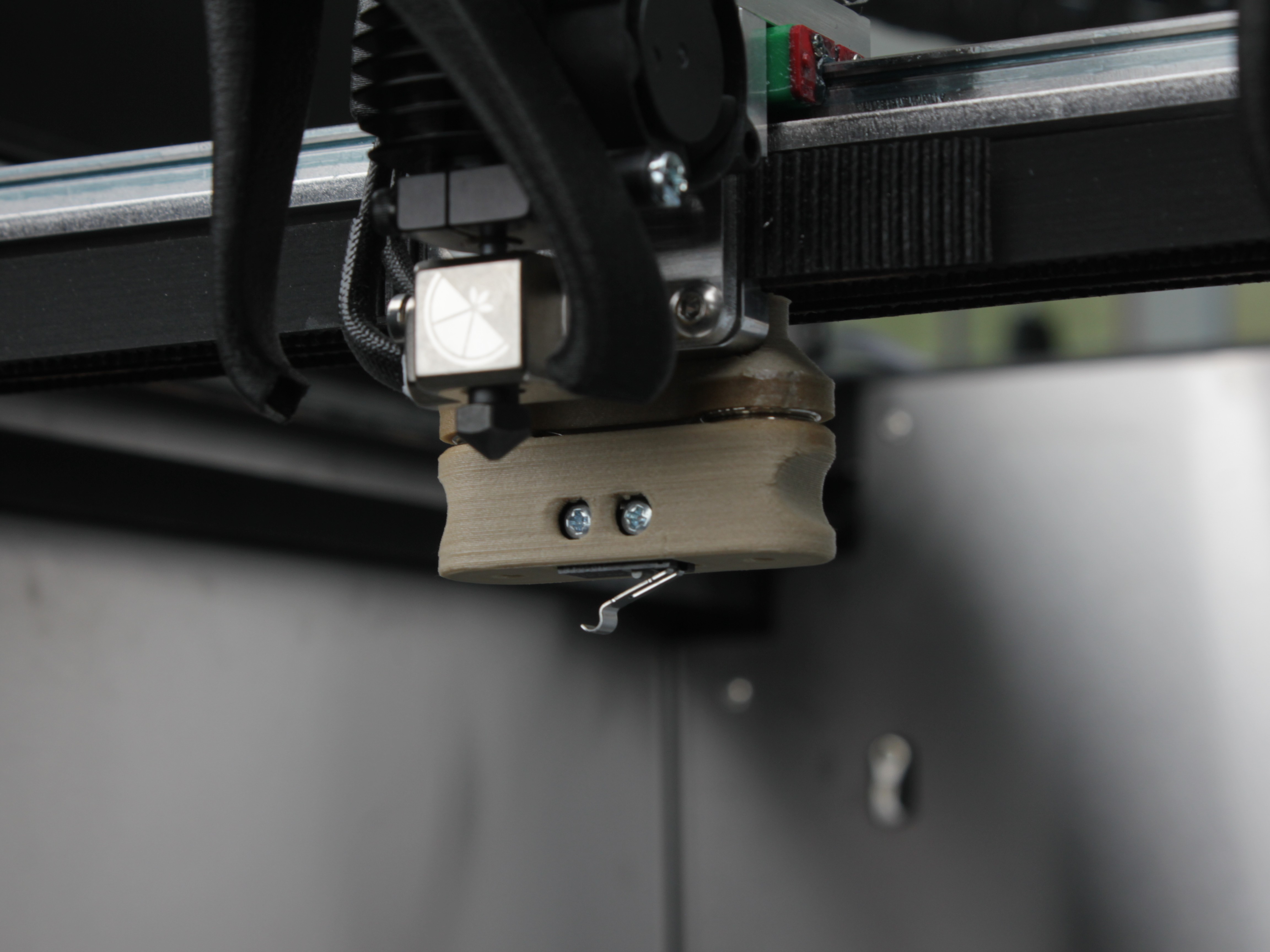 Z-Probe attached to toolhead holder after a successful pickup