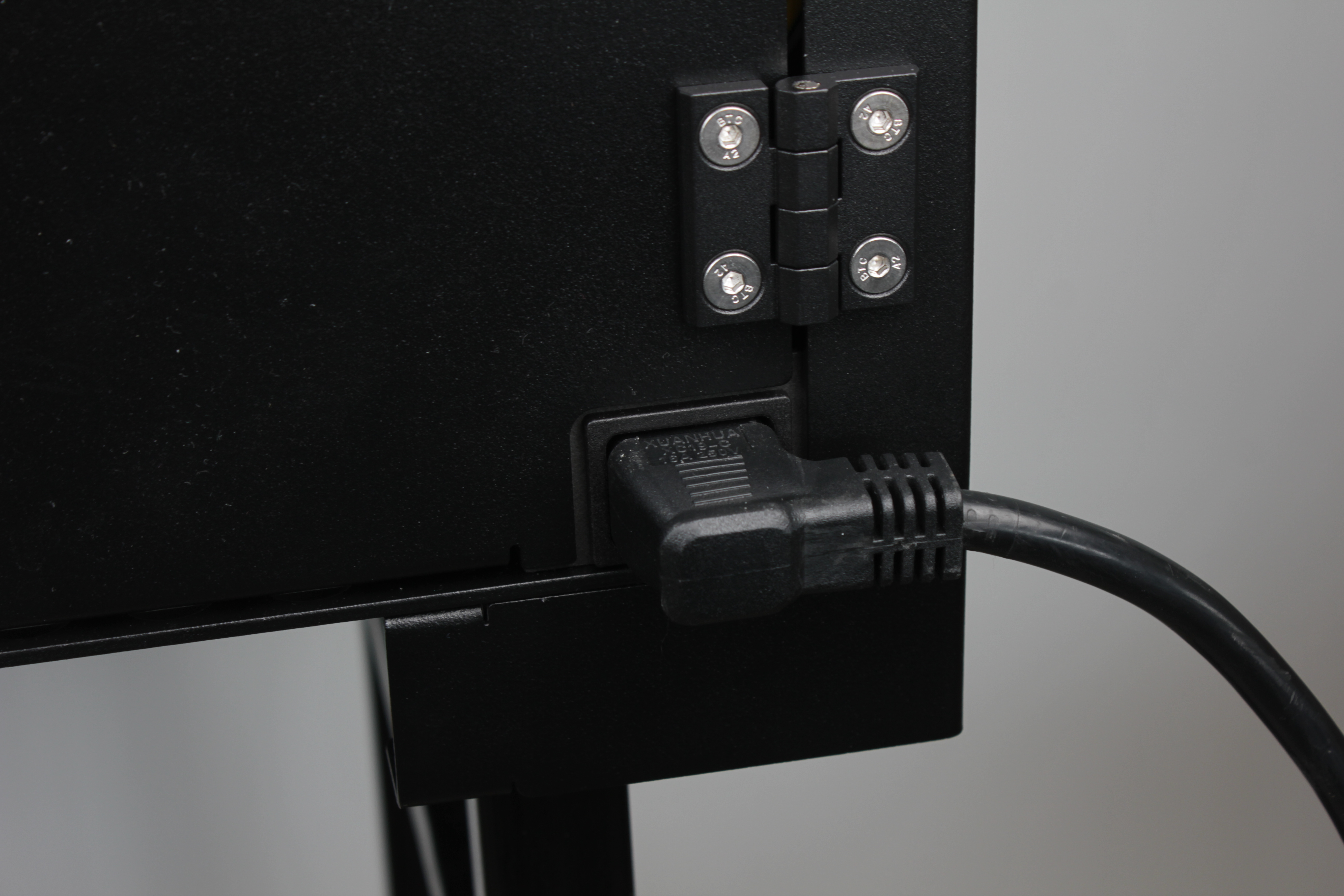 Power cord connected to printer and grounded outlet
