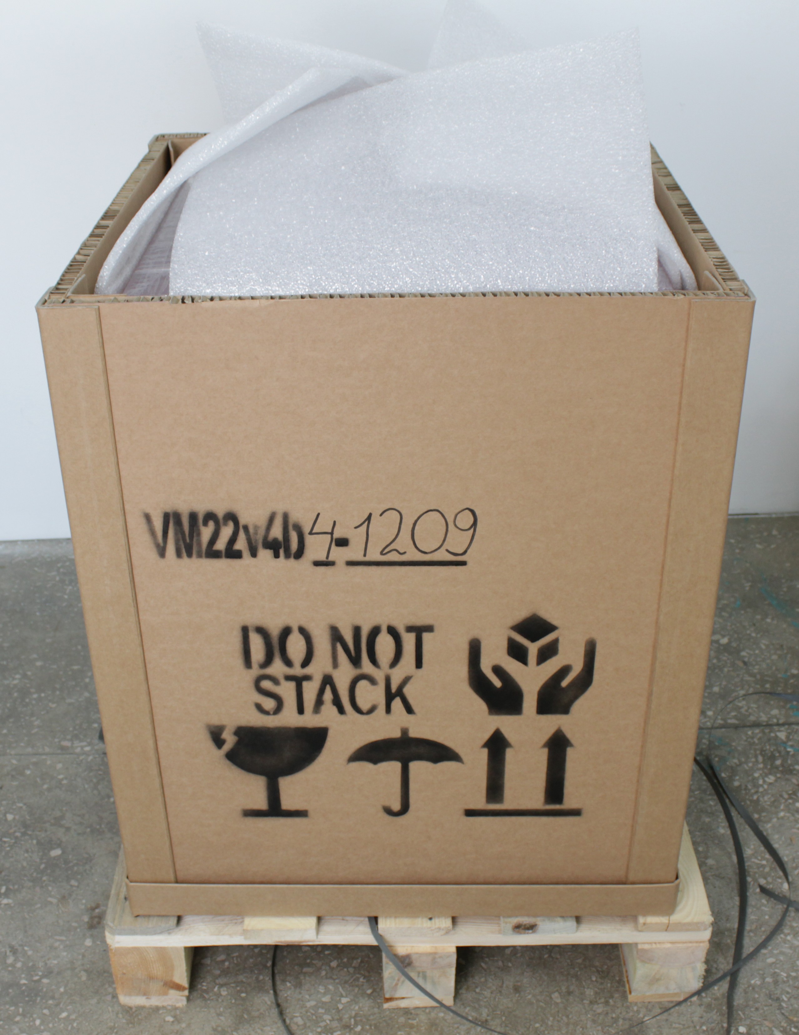 Removing top panel from shipping crate