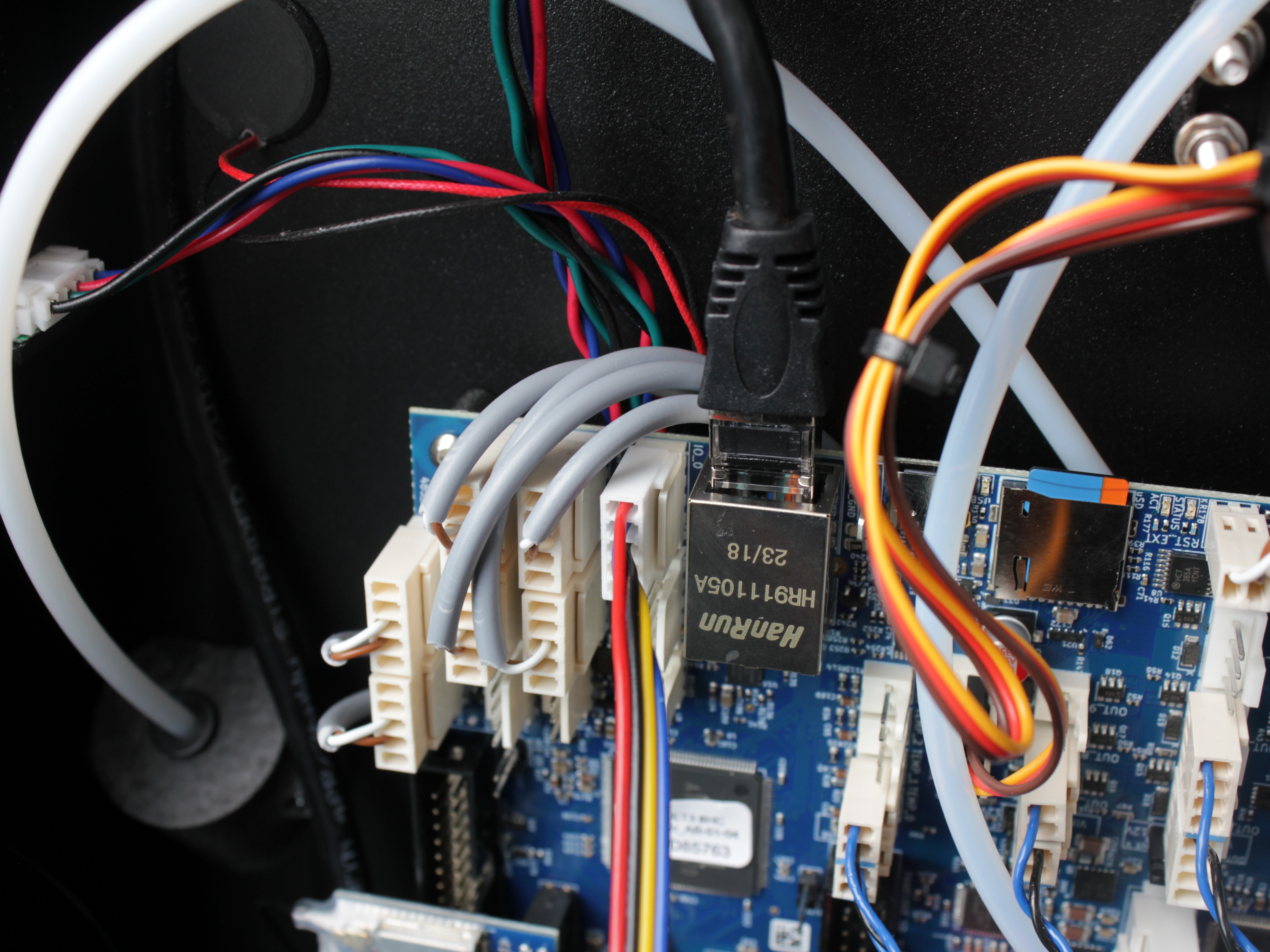 Touchscreen ribbon cable connected to mainboard