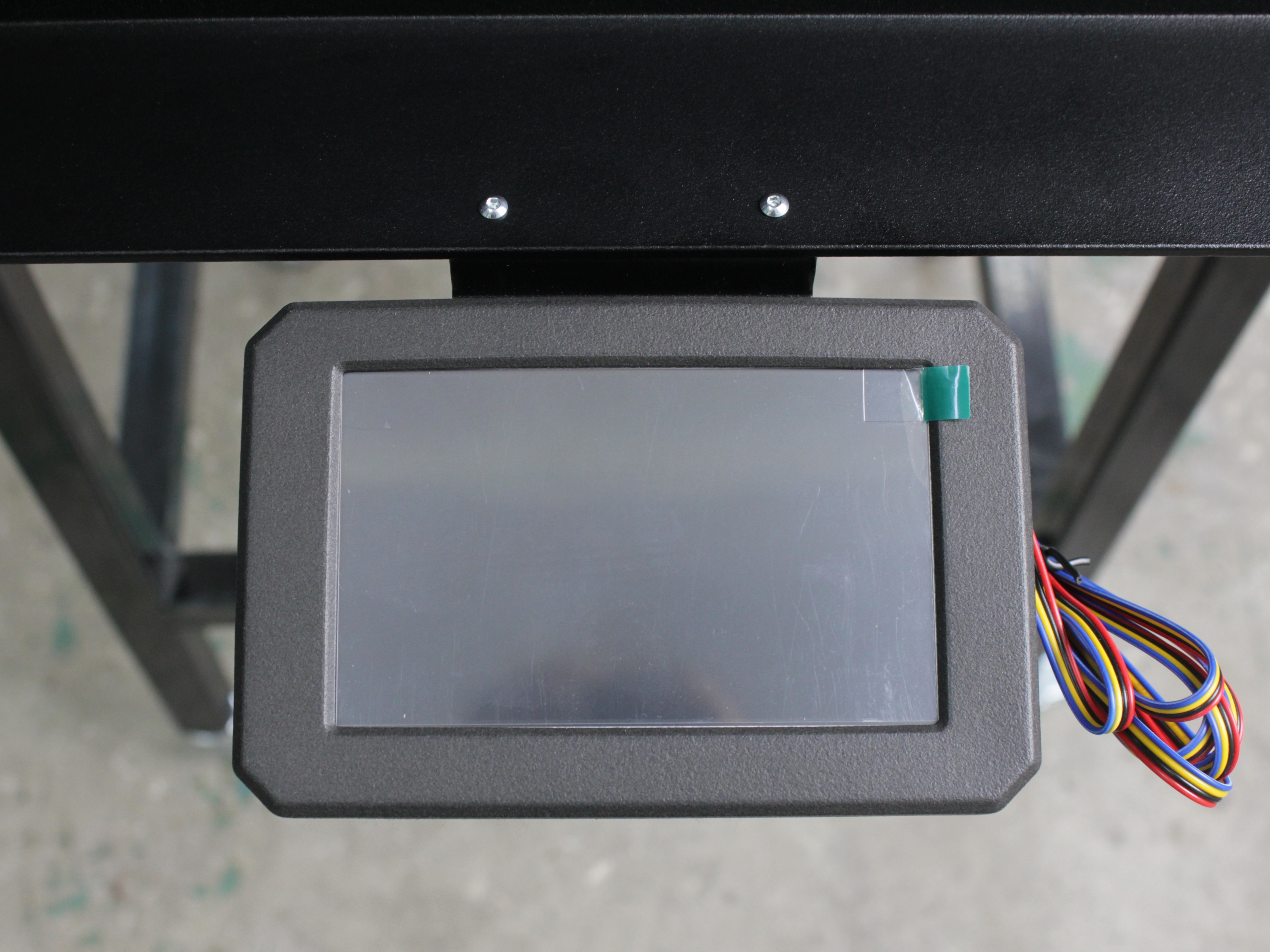 Touchscreen installed and secured with two screws
